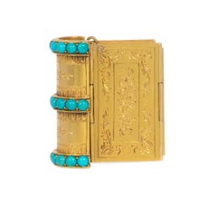 Antikes Armband in Buchform aus Gold und Türkis mit der Aufschrift „Souvenir“