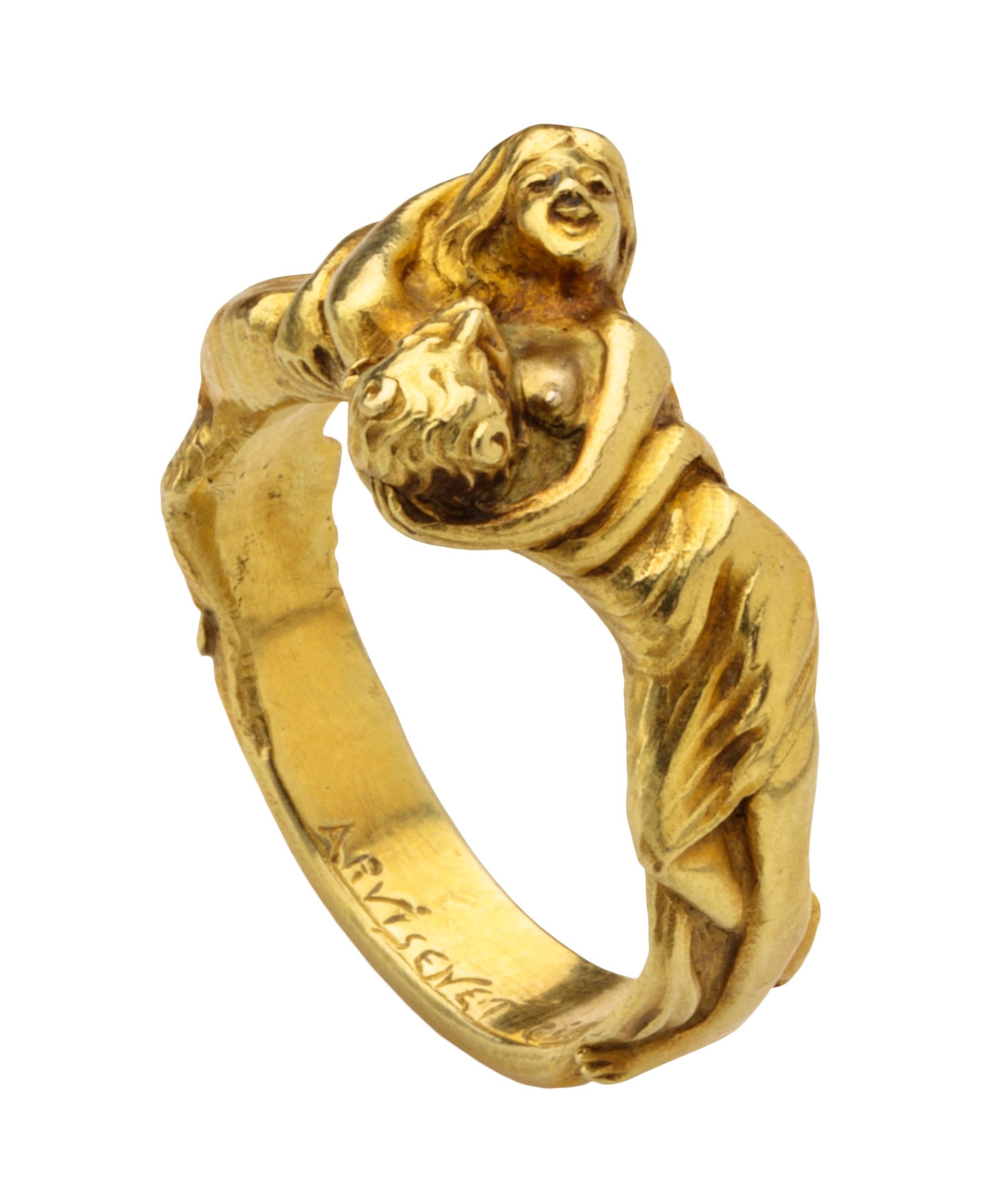 ART NOUVEAU NYMPH AND SATYR RING BY ARVISENET 
France, Paris?, c. 1900 
Gold 
Weight 17 gr., US size 10.5, UK size U ½ 

This sculptural ring is cast in gold and finely chased. The hoop is flat inside, while outside two entwined figures form the