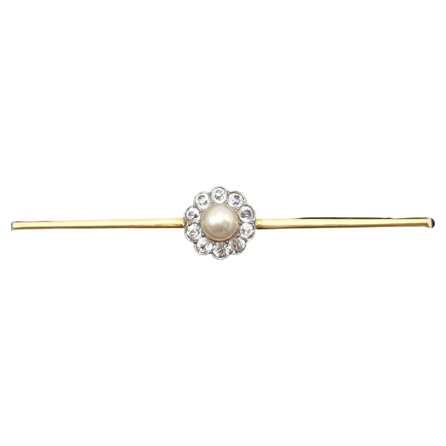 Antique gold bar brooch with pearl and white sapphires, Sweden, around 1920. For Sale