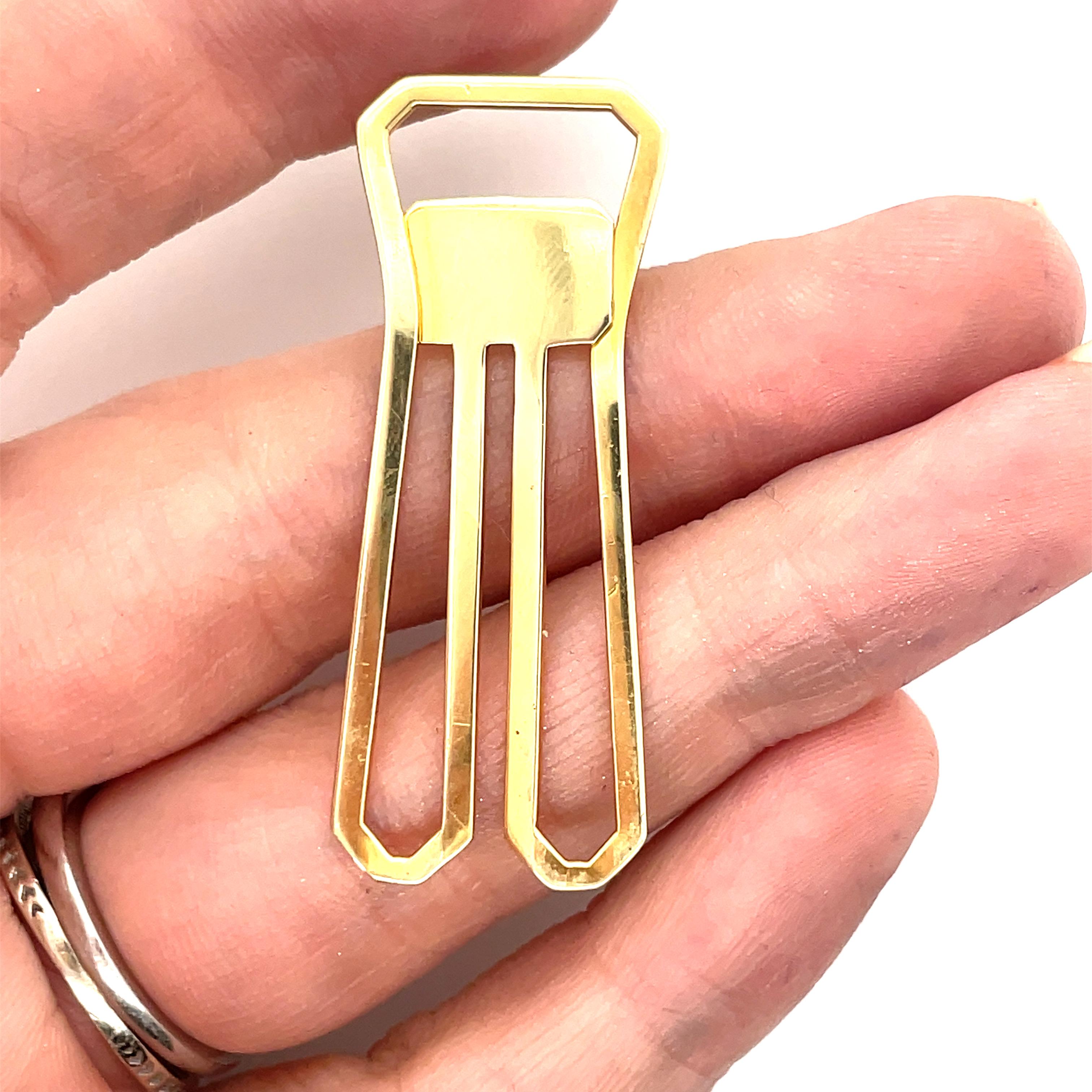 14K yellow gold bookmark.  Flexible, so it can be placed on the proper page.  1 3/4