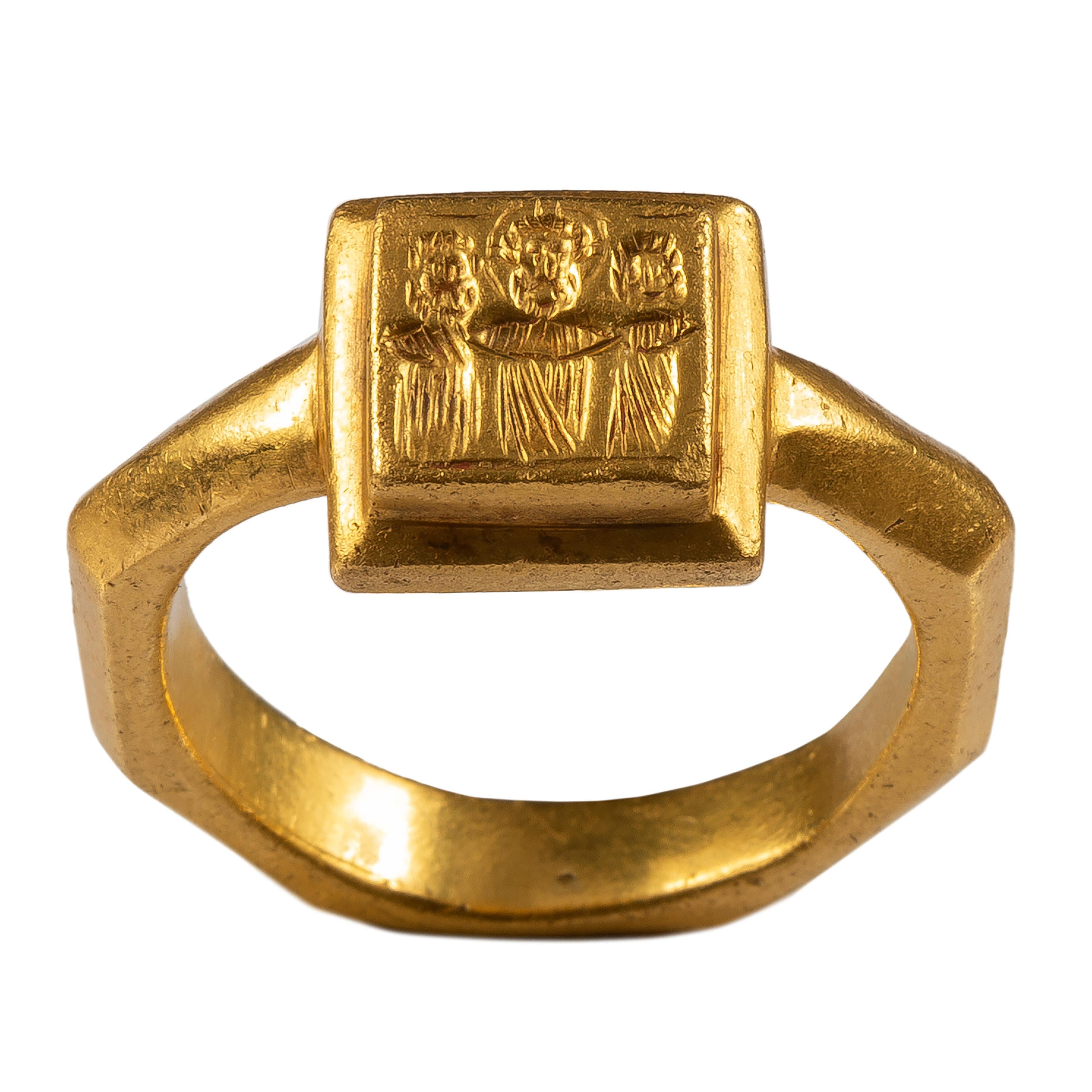 Byzantine Marriage Ring
Byzantine Empire, 6th – 7th century AD
Gold
Weight 15.8 gr; circumference 60.98 mm; US size 9 1/2; UK size S ¾

Heavy gold ring with an octagonal hoop set with a rectangular-shaped bezel. The hoop is composed of a central rib