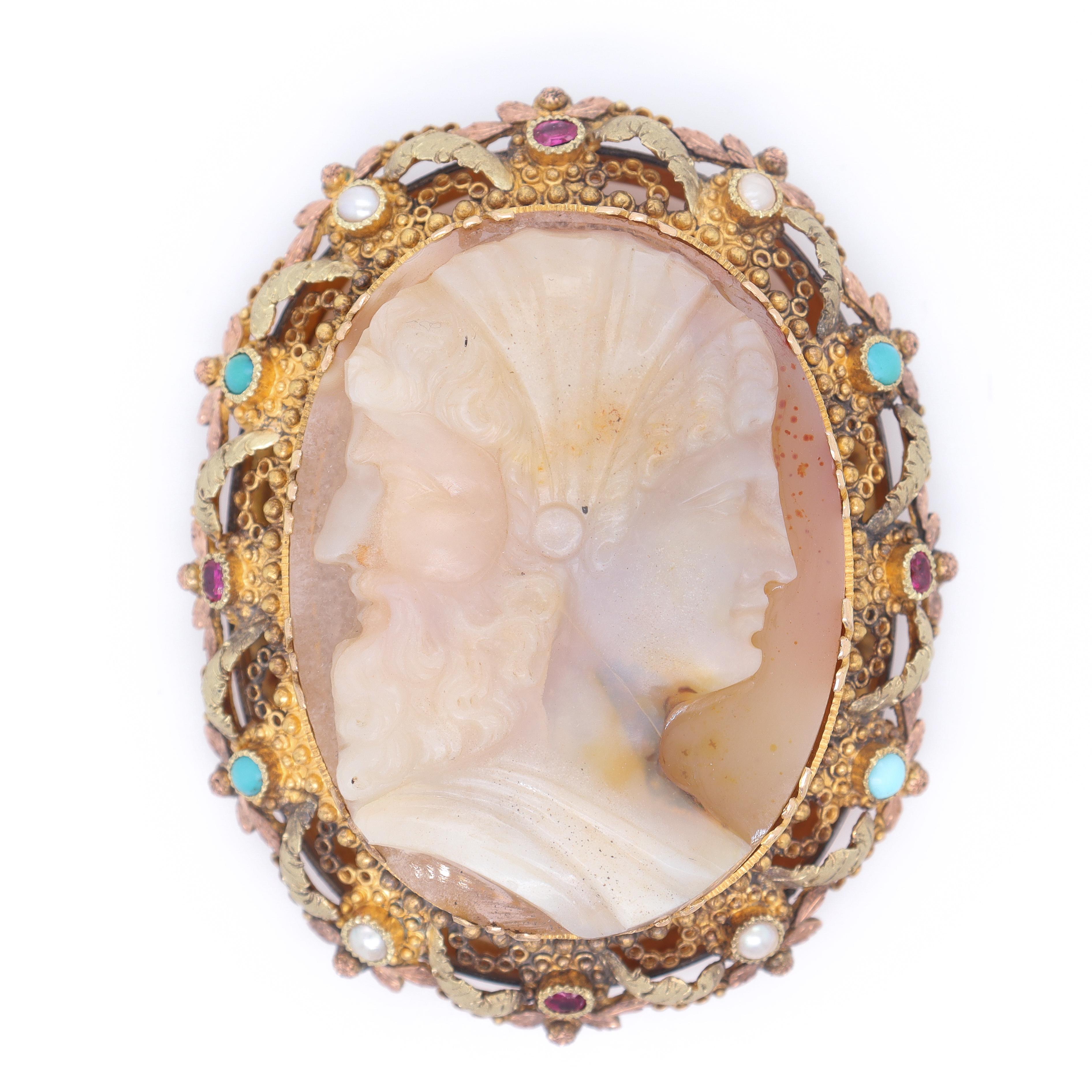 A very fine antique Victorian gold and carved agate or hard stone cameo clasp for a multi-strand bracelet or necklace.

In rose, yellow, and green golds. 

The cameo depicts a double profile of a hermaphroditic man and woman after the Antique. 

It