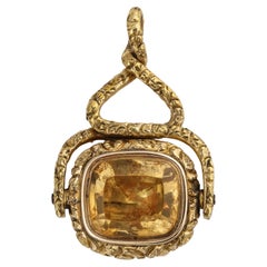 Porte-bonheur en citrine sertie d'or antique