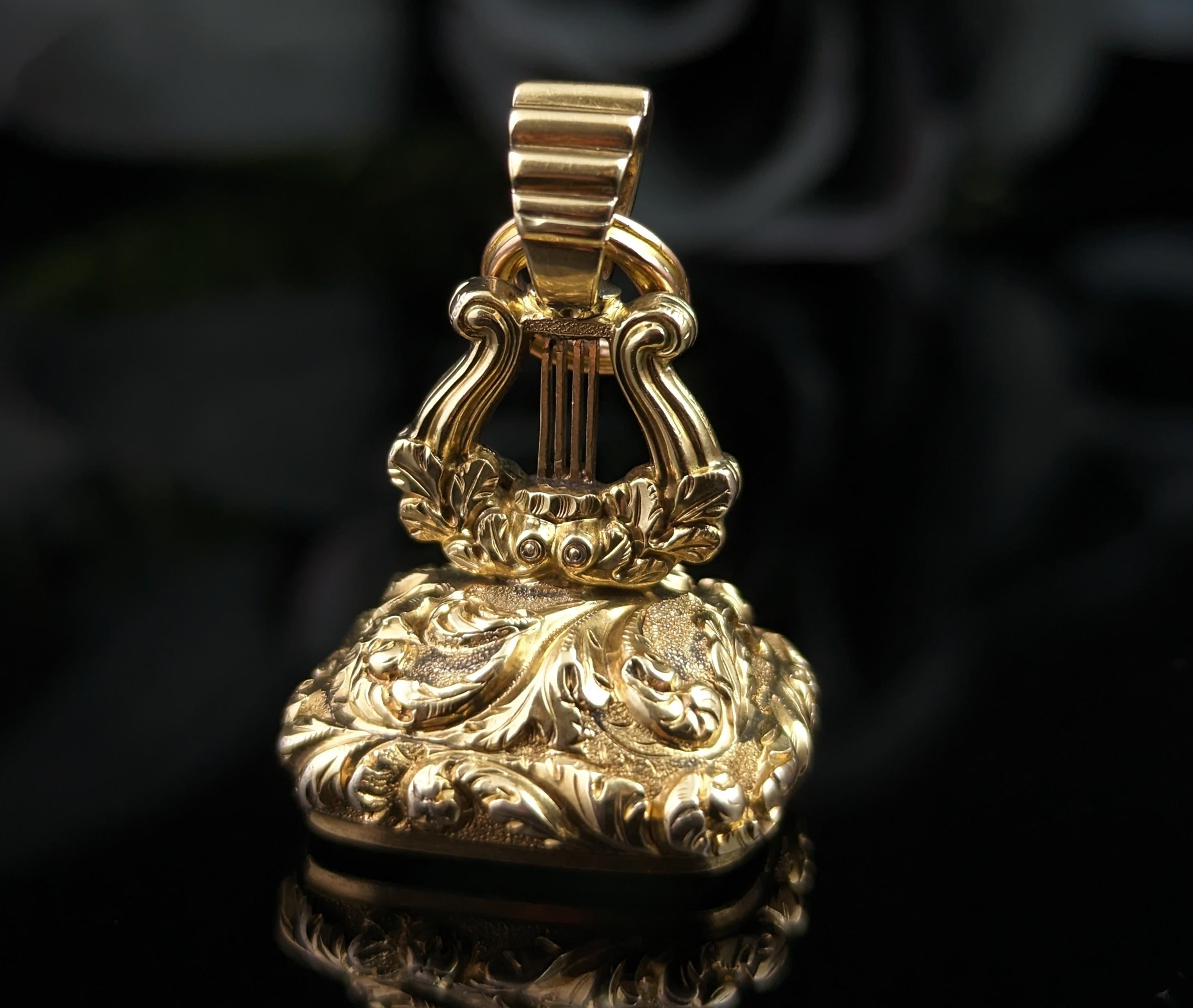 You can't go wrong with a beautiful antique seal fob, this heavy and substantial antique gold cased seal fob is a real versatile beauty.

Made from 9kt yellow gold cased metal, possibly low grade silver, early Victorian era, it has an elaborate