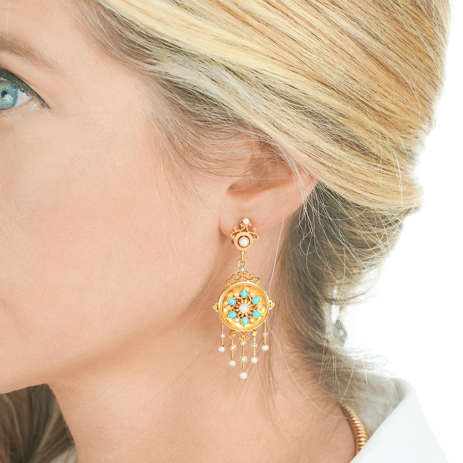 Circa 1880s, 18k, French.  These antique chandelier earrings are set with brilliant blue Persian Turquoise in a stylishly refreshing revivalist design. Intricate gold-work, underscored by meticulous hand-fabrication and delightful movement, all add