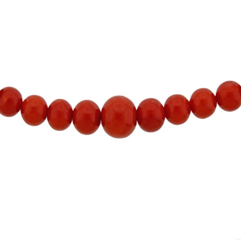 18k gold necklace clasp. Coral beads - 5.1mm to 11.3mm. Measures - 19