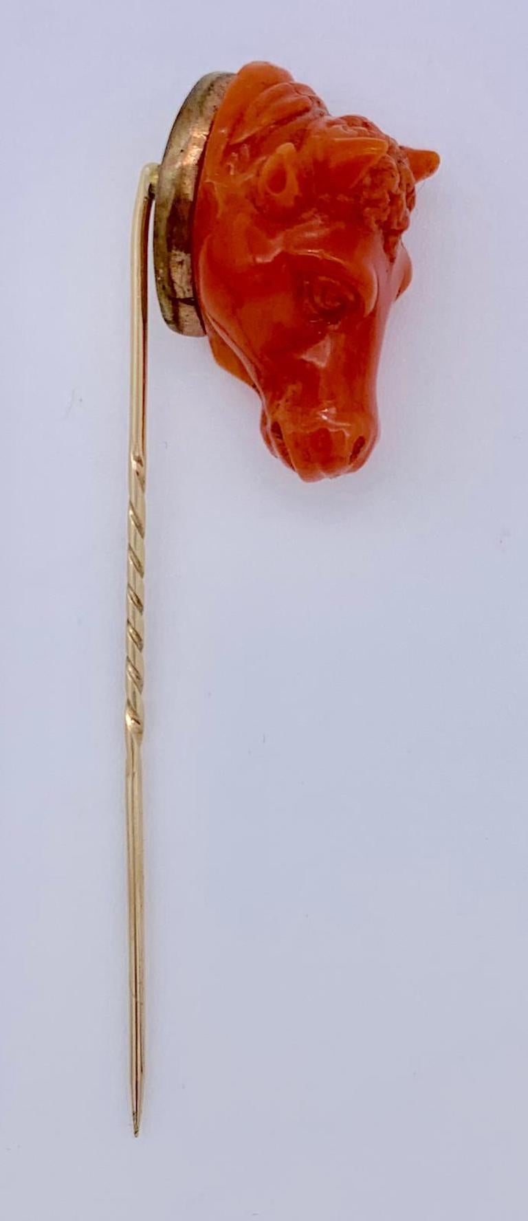 The coral has been finely carved in the shape of a bull´s head. The taurus is mounted on metal backing. The pin is made out of 9 k gold. The carving dates from around 1840.