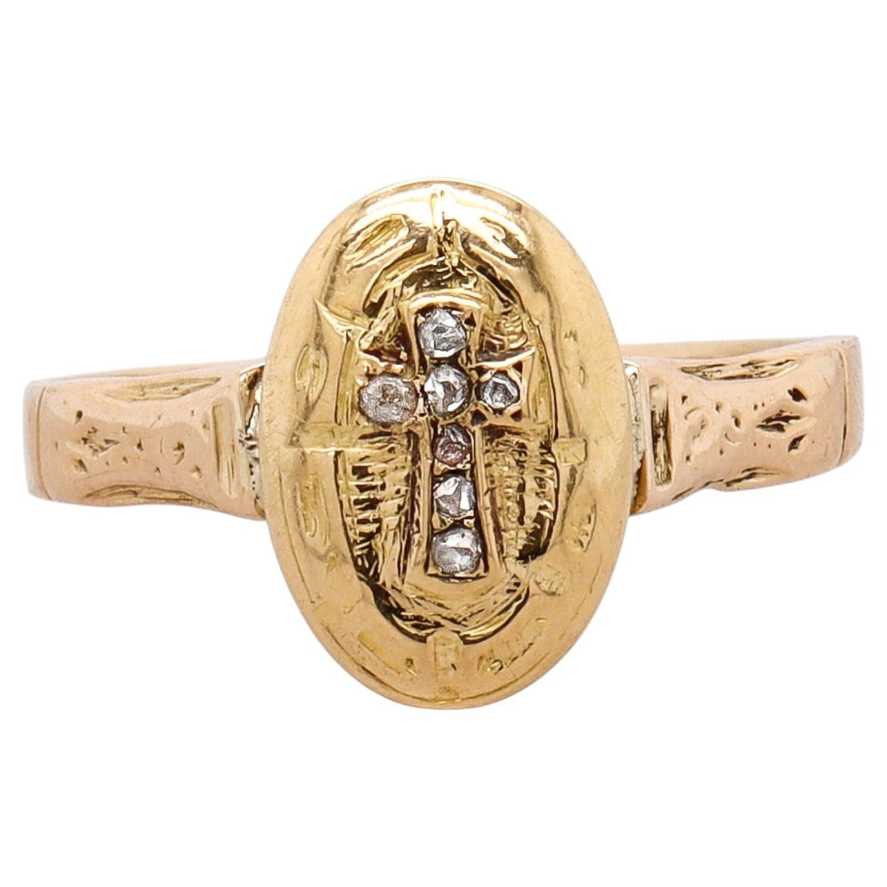 Antiker Ring im Siegelring-Stil mit Gold und Diamanten in Kreuzform