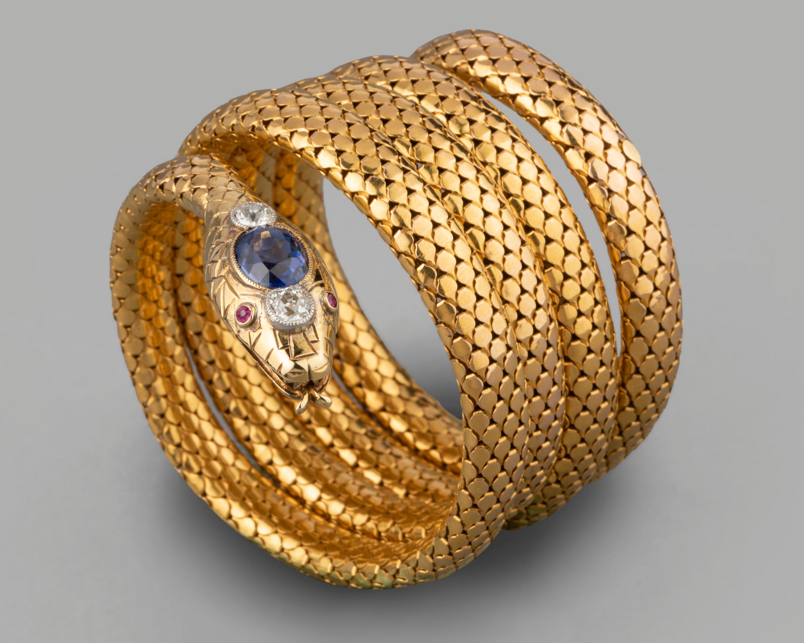 Antique Gold Diamonds and Sapphire French Snake Bracelet

Very beautiful bracelet, made in France circa 1870.
Made in yellow gold 18k (multiple mark, the eagle head). The diamonds weights 0.40 carats each. Mark of patent (certifié SGDG).
The