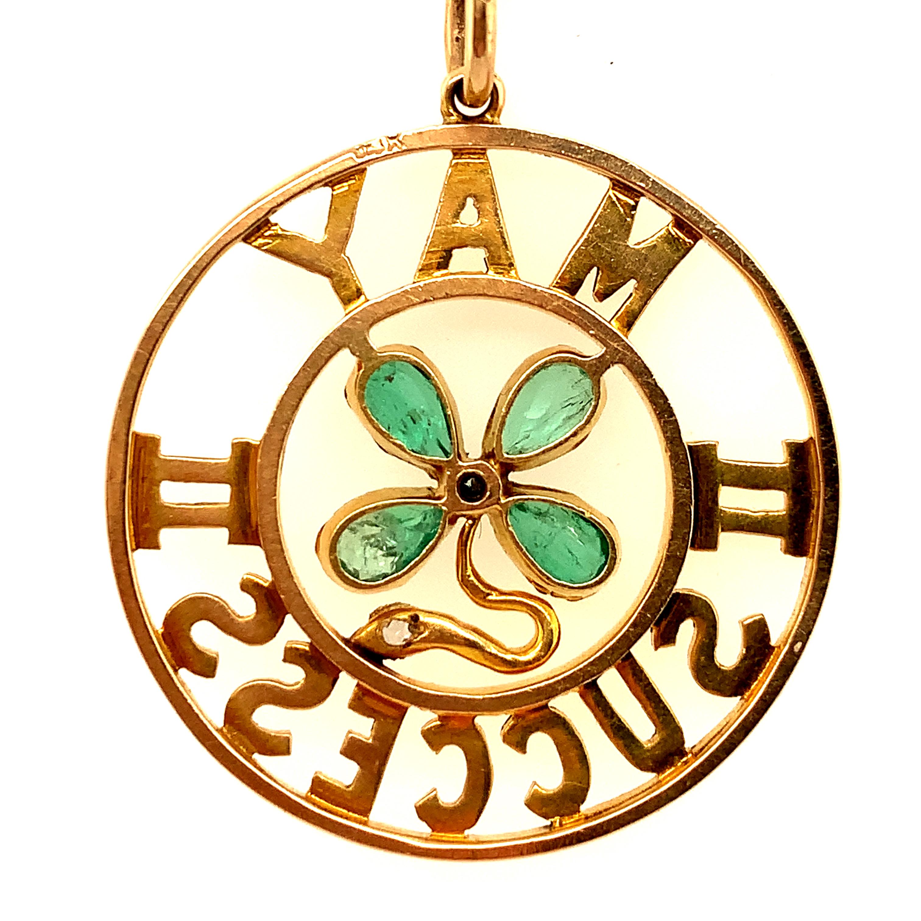 Outstanding pendant/charm:  Two cut-out circles.  The center circle is set with a figural 