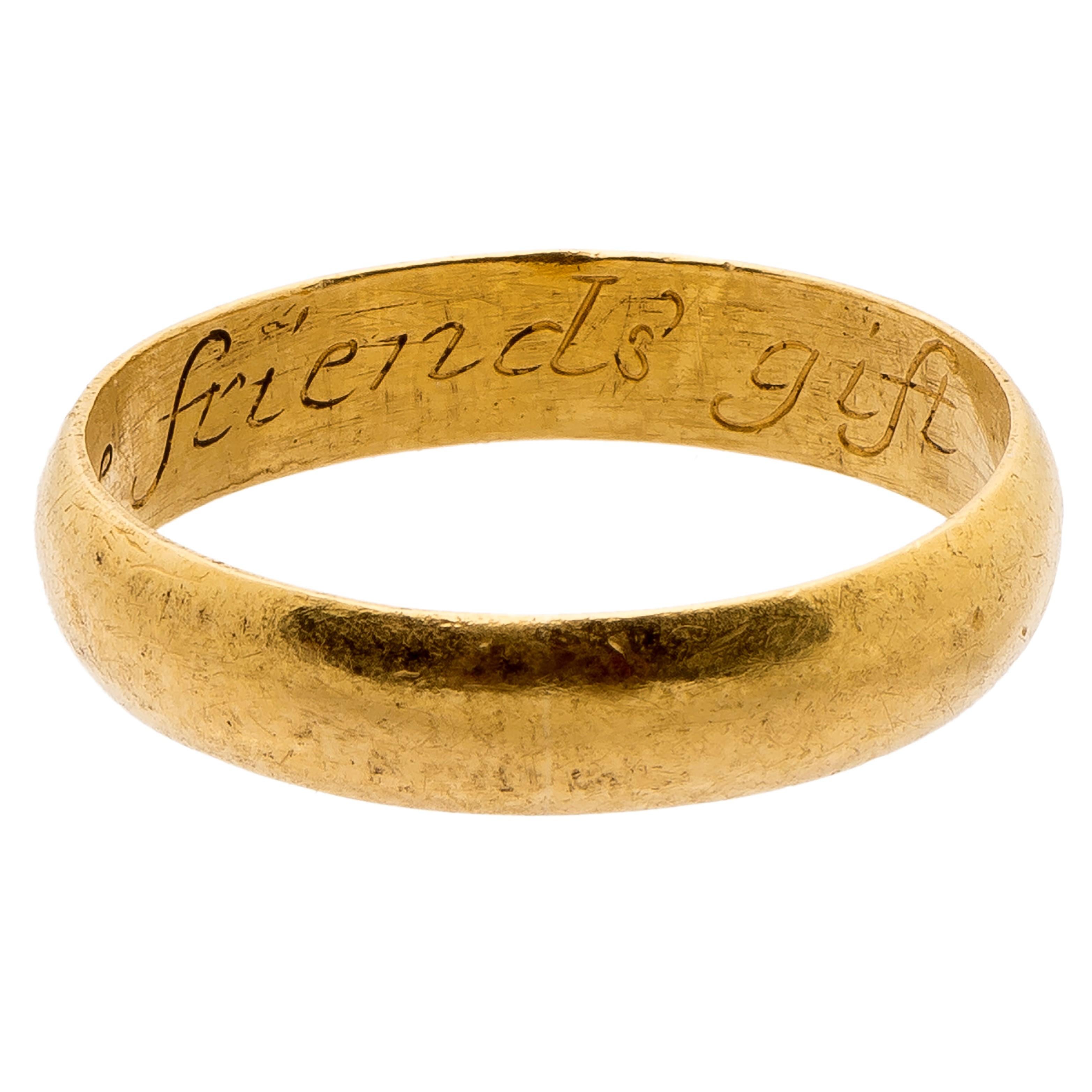 Posy Ring, “A true friends gift”
England (Plymouth ?), first half of 18th century  
Gold
Weight 4.2 gr.; circumference 60.38 mm.; US size 9.25, UK size S ¼

Description:
Wide gold band with D-section, plain on the exterior and on the interior is the