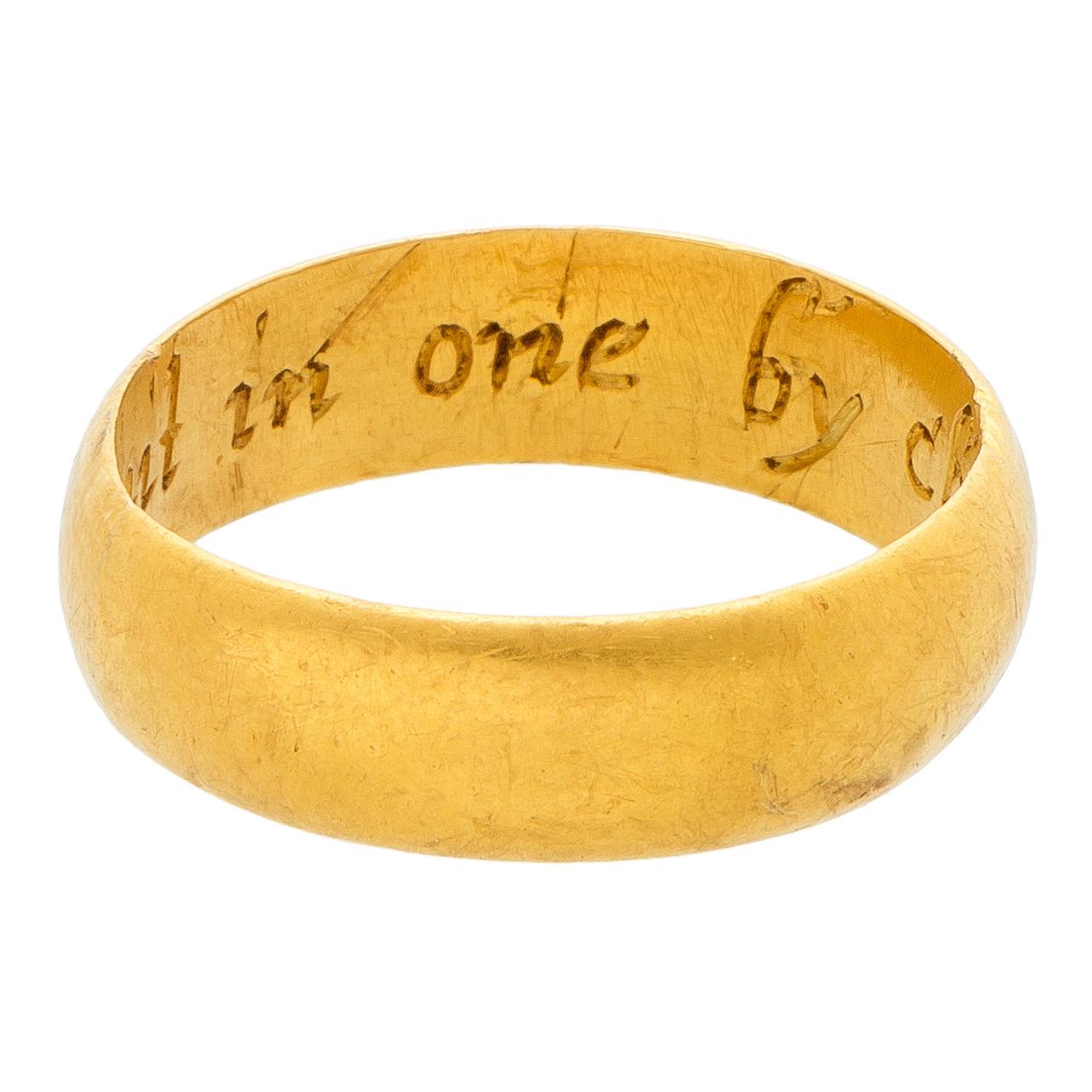 Posy Ring “Knit in one by christ alone” 
England, late 17th-early 18th century 
Gold 
Weight 5.1 gr.; circumference: 55.76 mm.; US size 7.5; UK size P

A wide gold band with D-section and inside the engraved inscription “Knit in one by Christ