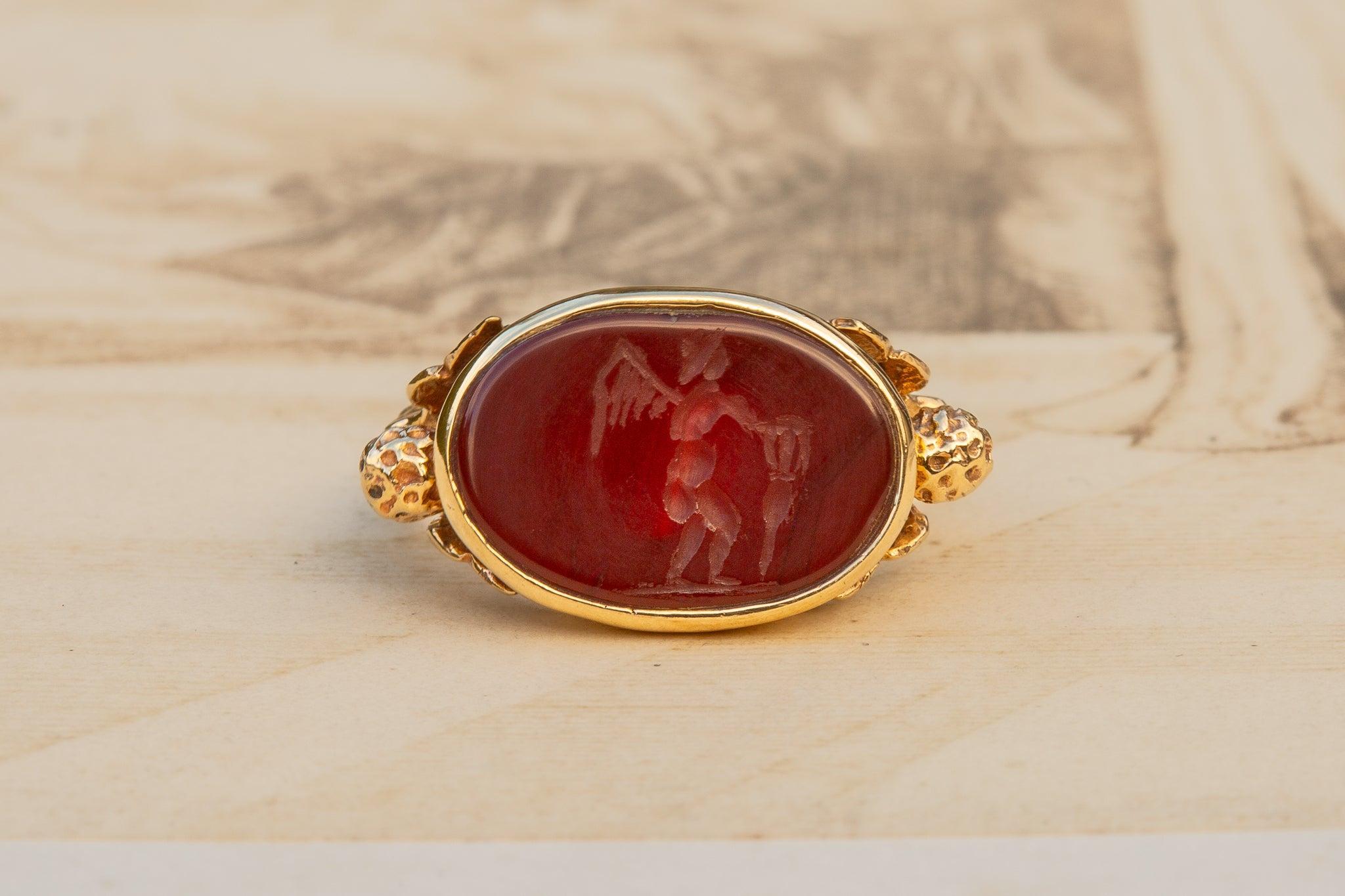 Classical Roman Antique Gold Engraved Carnelian Cherub Eros Intaglio Ring Signet Ring For Sale