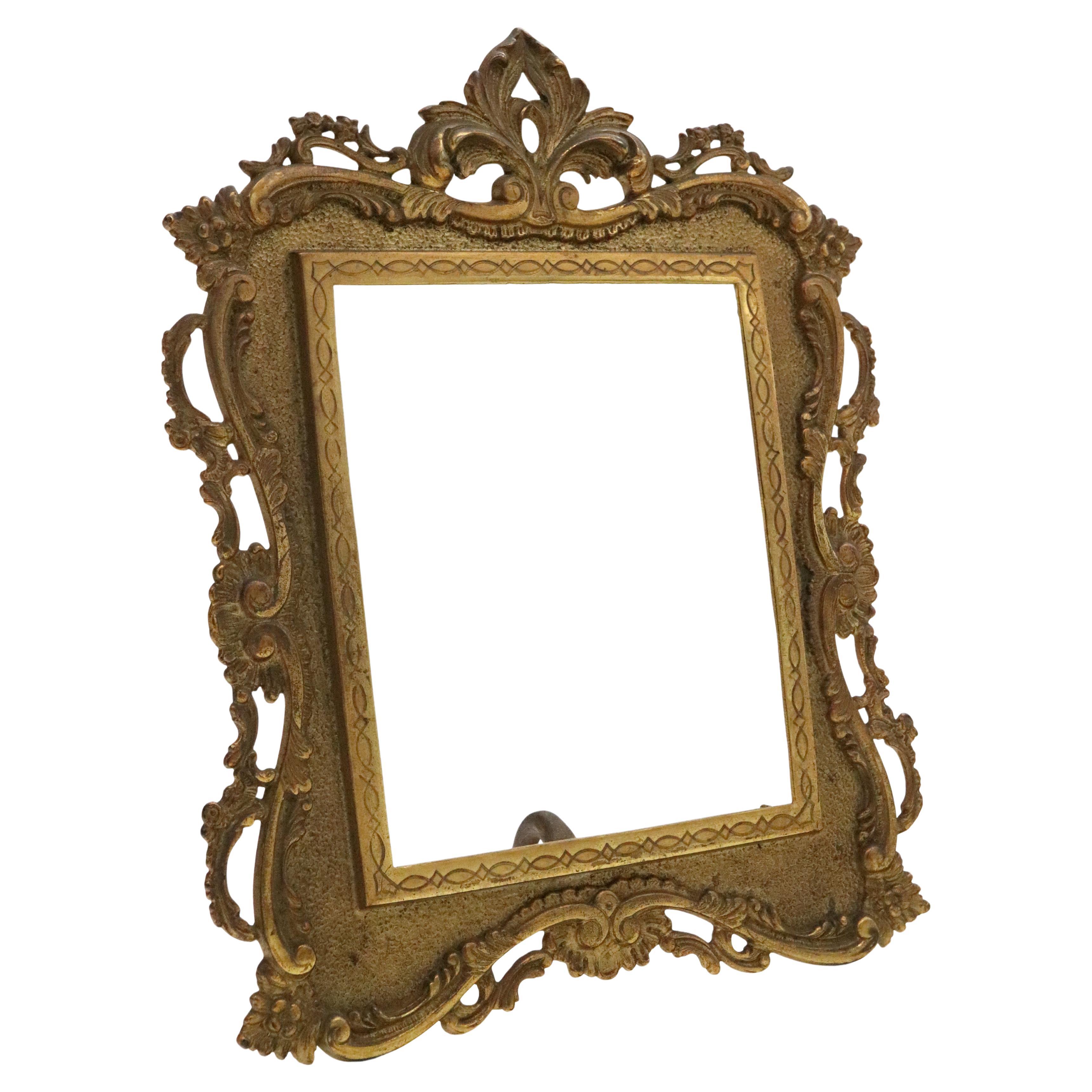 Cadre photo en fonte avec miroir, finition or antique en vente