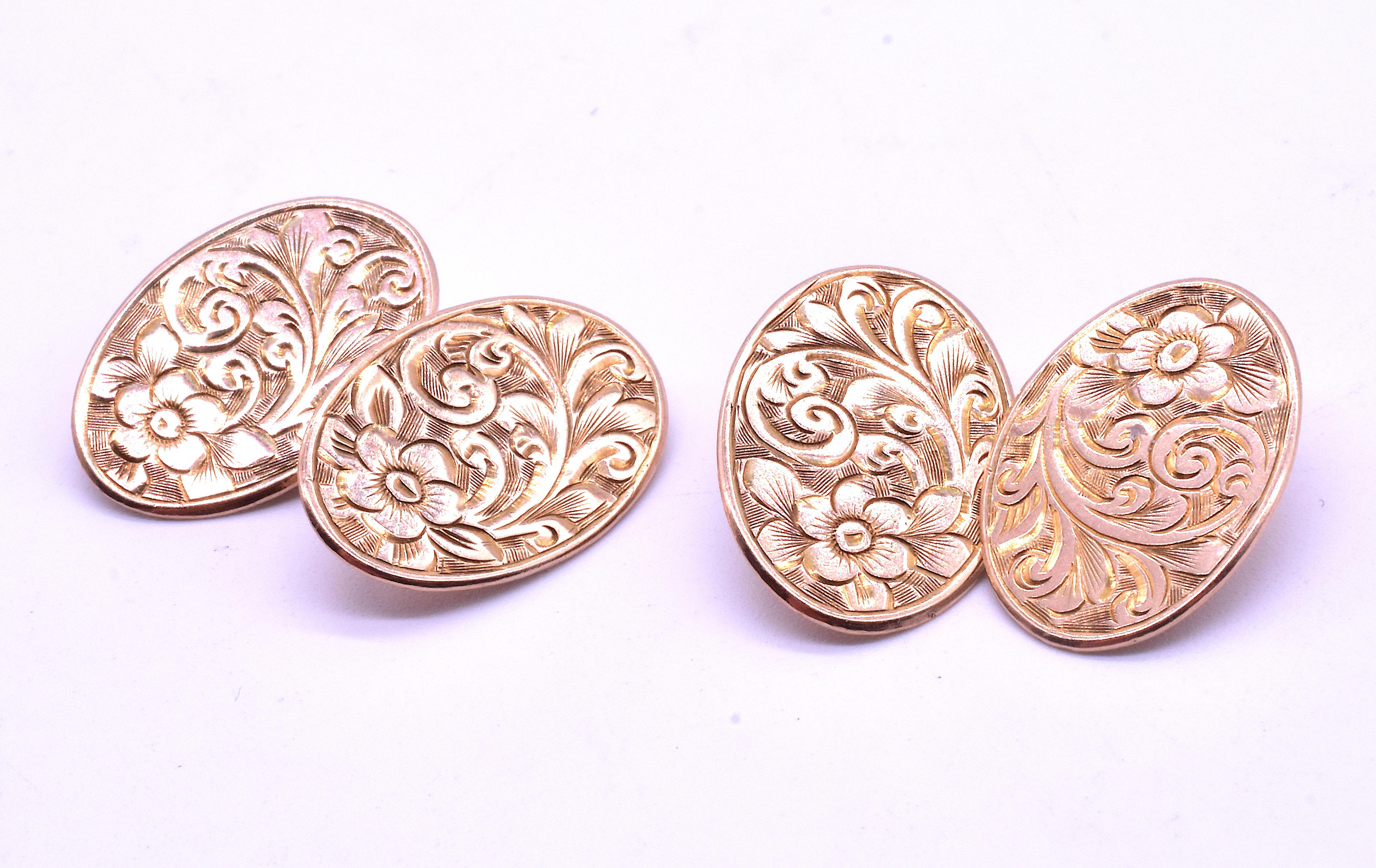 These lovely Antique double sided 9K oval cufflinks are beautifully incised with trailing, leaves and petals. Not a straight line to be seen, these cufflinks are a great example of the Art Nouveau style. We love that they are double sided and the 9K