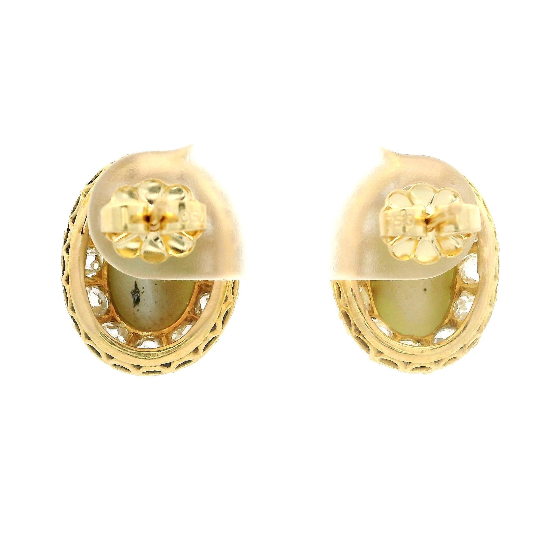 --Stone(s):--
(2) Natural Genuine Chrysoberyl Cat's Eyes - Oval Cabochon Cut - Bezel Set - Greenish Yellow Color 
** See Report Details Below for Complete Info on the Chrysoberyl **
(24) Natural Genuine Diamonds - Chunky Old Mine Cut - Pave Set -