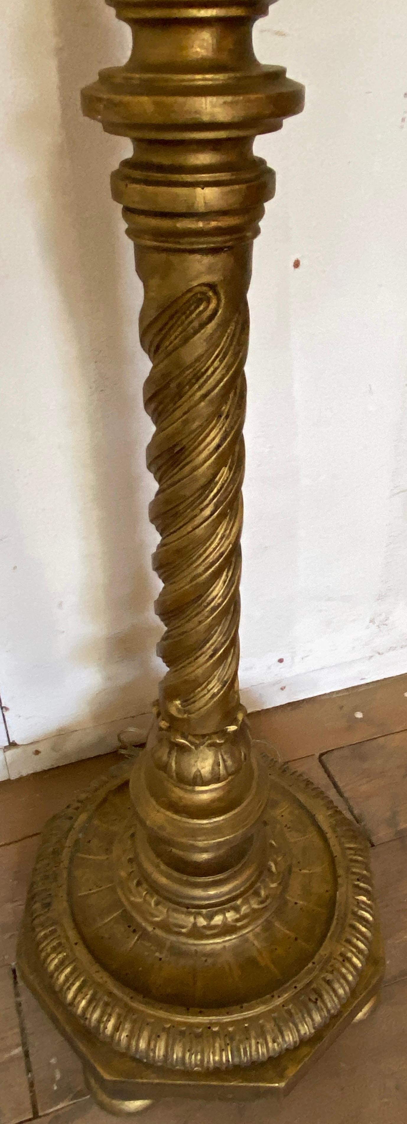 Classic antique Italian baroque style barley twist turned column carved giltwood candle floor lamp with great style and presence.  Newly rewired with foot switch attached to lamp chord.
Search terms:
Italian Renaissance style floor lamp.
Hollywood