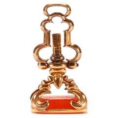 Antique gold hidden watch key spinning carnelian pendant, England 1870.  