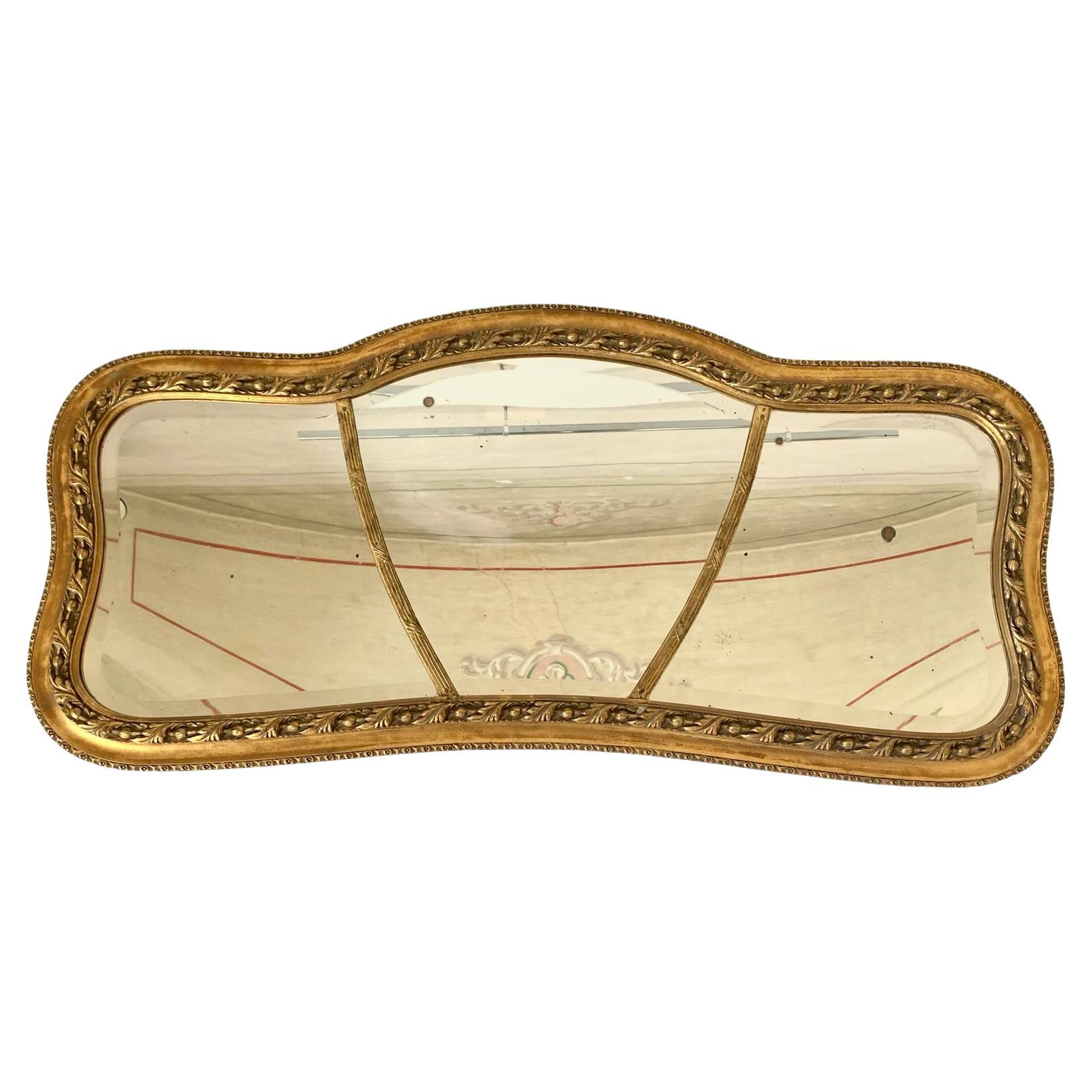 Antique gold Mirror, Italy 1850s.
A rare 19th century gold leaf rectangular mirror with classy refined frame.
The mirror is made of a solid wood frame with gold leaf finishing and finely refined with elegant details. 

Original cut glass mirror with