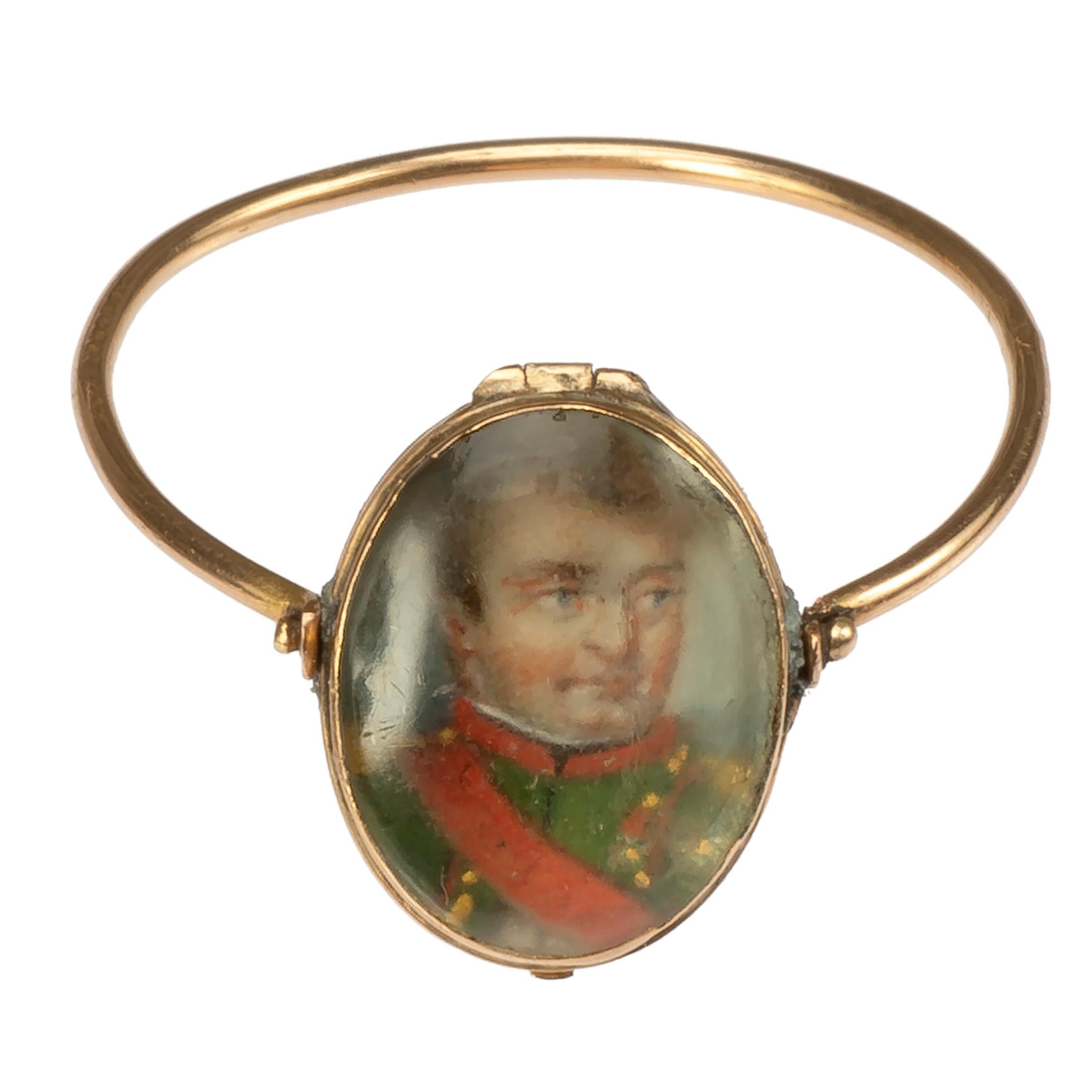 Swivel Ring with Portrait of Napoleon in a Crystal Locket 
France, c. 1815
Weight 1.7 gr.; bezel 12.6 x 10 mm.; circumference 58.21 mm.; US size 8 1/2; UK size Q 3/4	

The bezel of this rare historic ring bears a portrait painted on bone of
