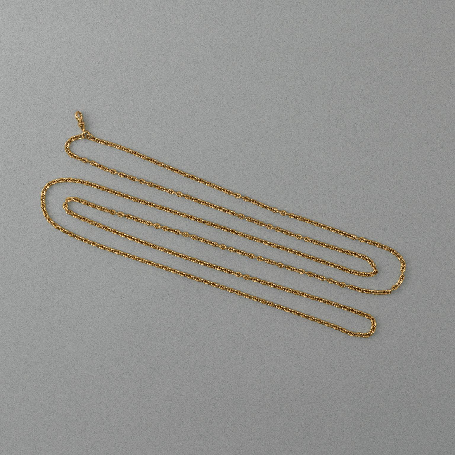 An 18 carat gold long chain with a mariner link, circa 1900, England.

weight: 77.69 grams
length: 162 cm