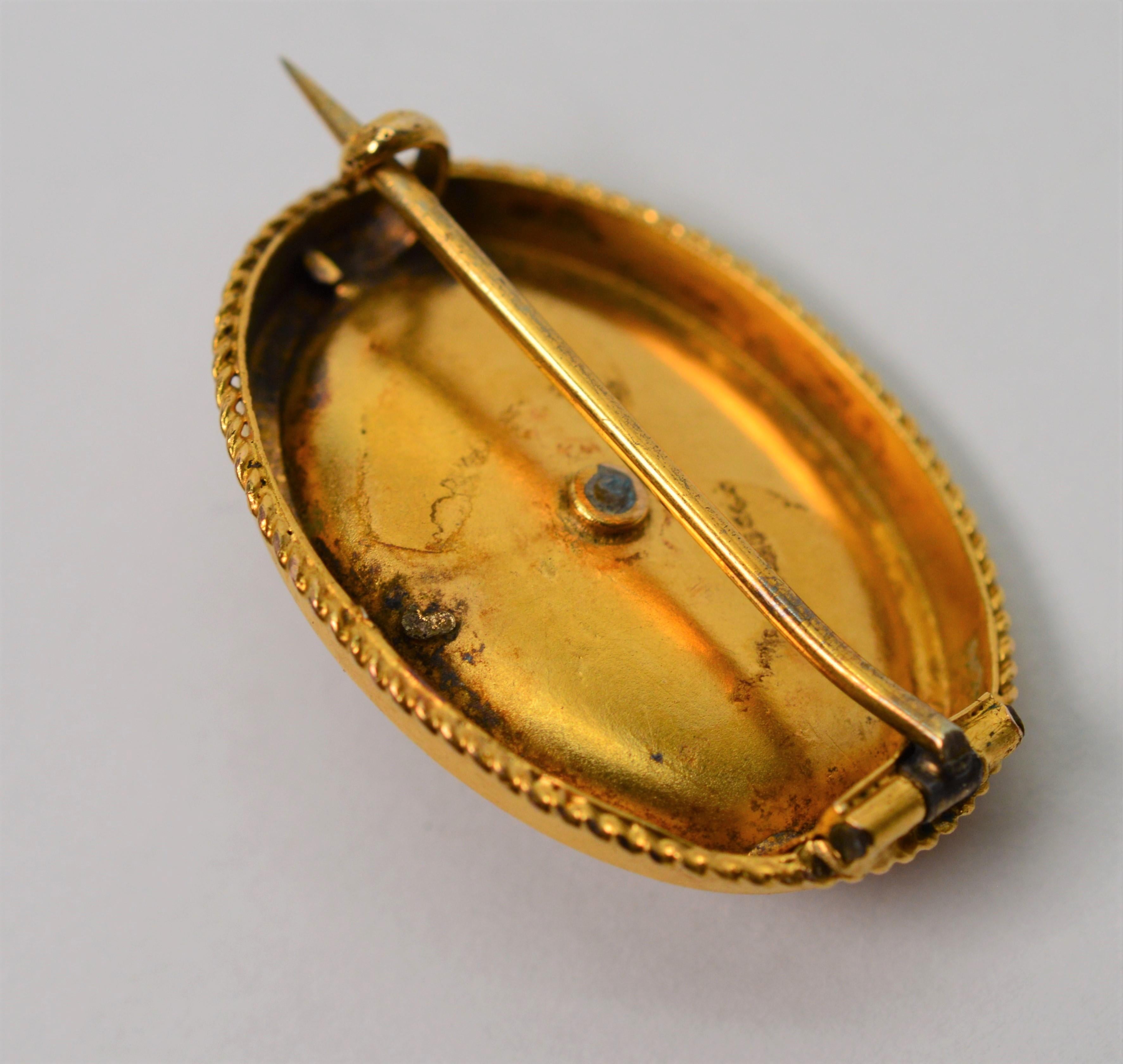 antique brass brooch