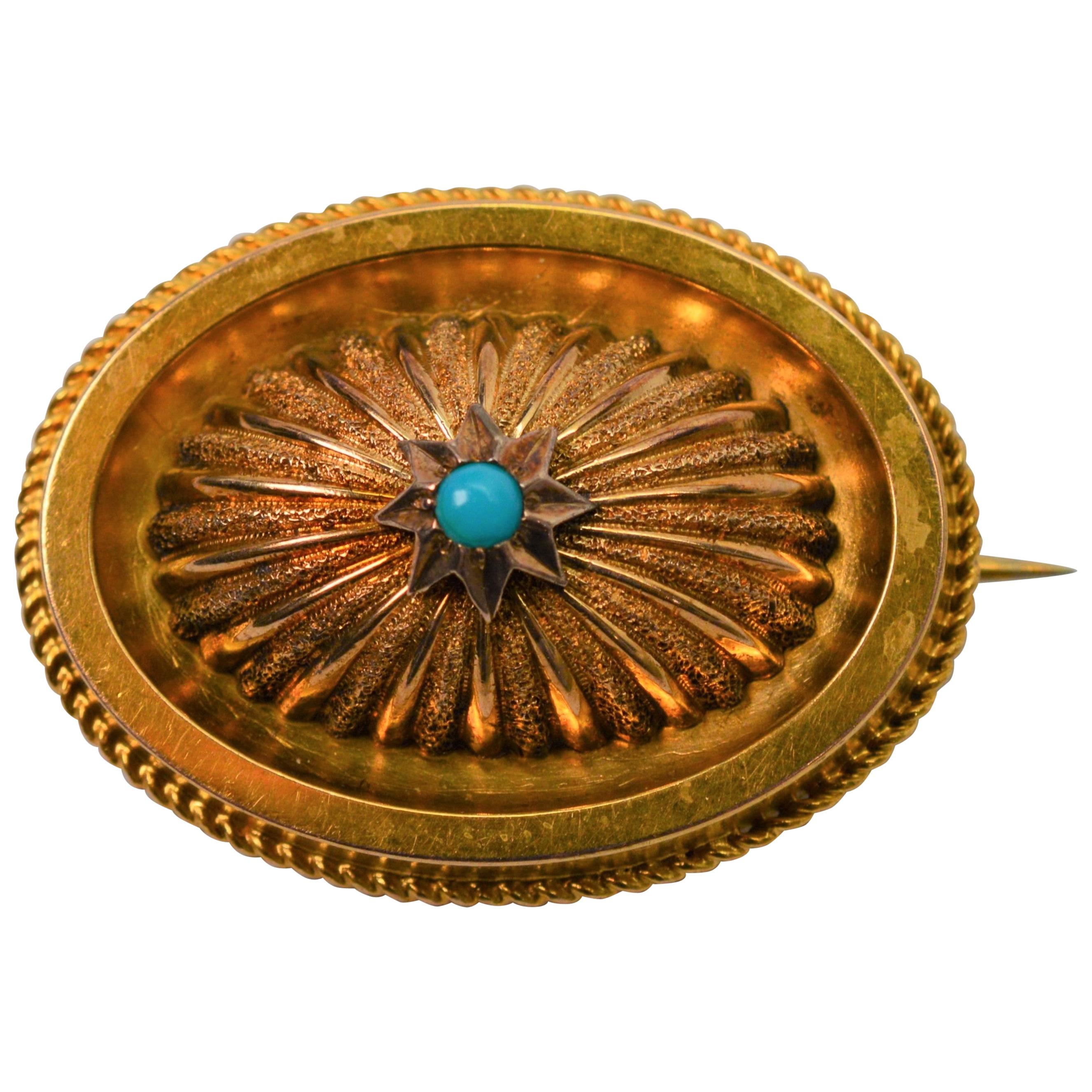 Antique Gold Medallion Brooch with Turquoise Accent For Sale