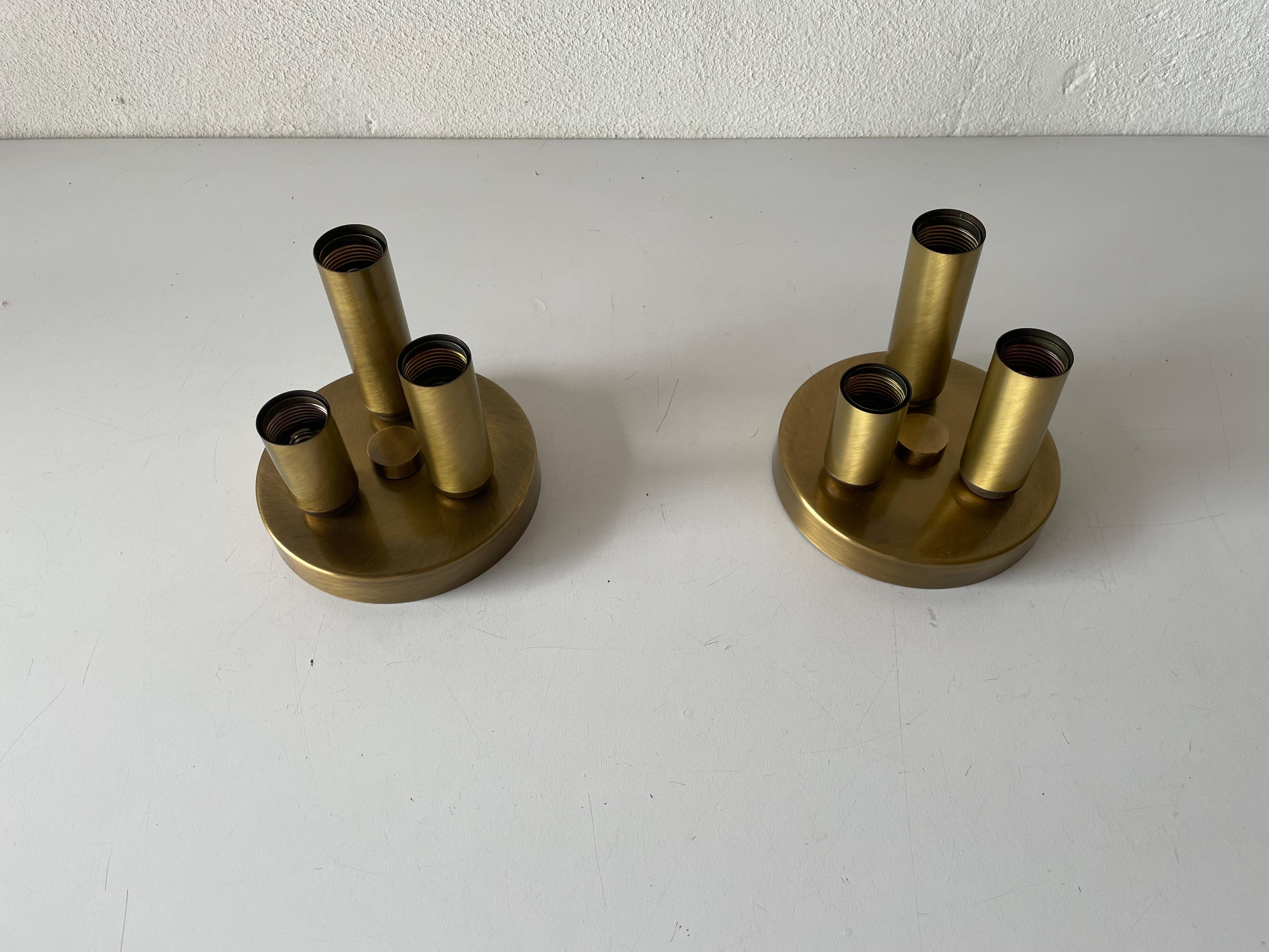 Rare Space Age Antique gold metal triple tube mini pair of ceiling lamps by TZ, 1960s, Germany

Very elegant and Minimalist wall lamps

Lamps are in very good condition.

These lamps works with 3x E14 standard light bulbs. Max 40 W
Wired and