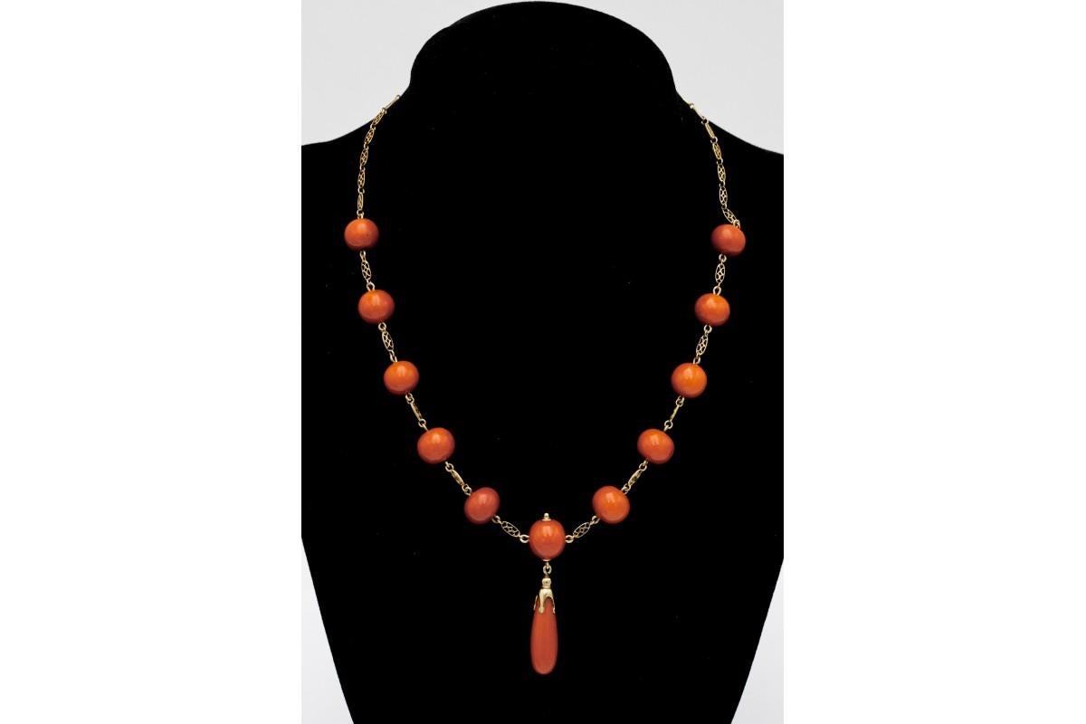 Antique gold necklace with corals comes from Italy from the mid-20th century.

The necklace consists of eleven red-orange beads

Made of 14 carat yellow gold

Length: 53cm

Item weight: 25.7g

Very good condition without any reservations

A jewelry