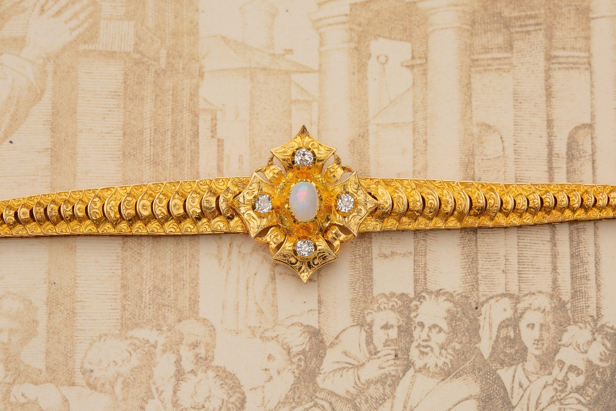 A superb antique 19th century gold opal and diamond bracelet, circa 1880.

This large and magnificent bracelet was made in either France or England and it weighs an impressive 27 grams of 21K gold. Despite its significant age, it has survived in