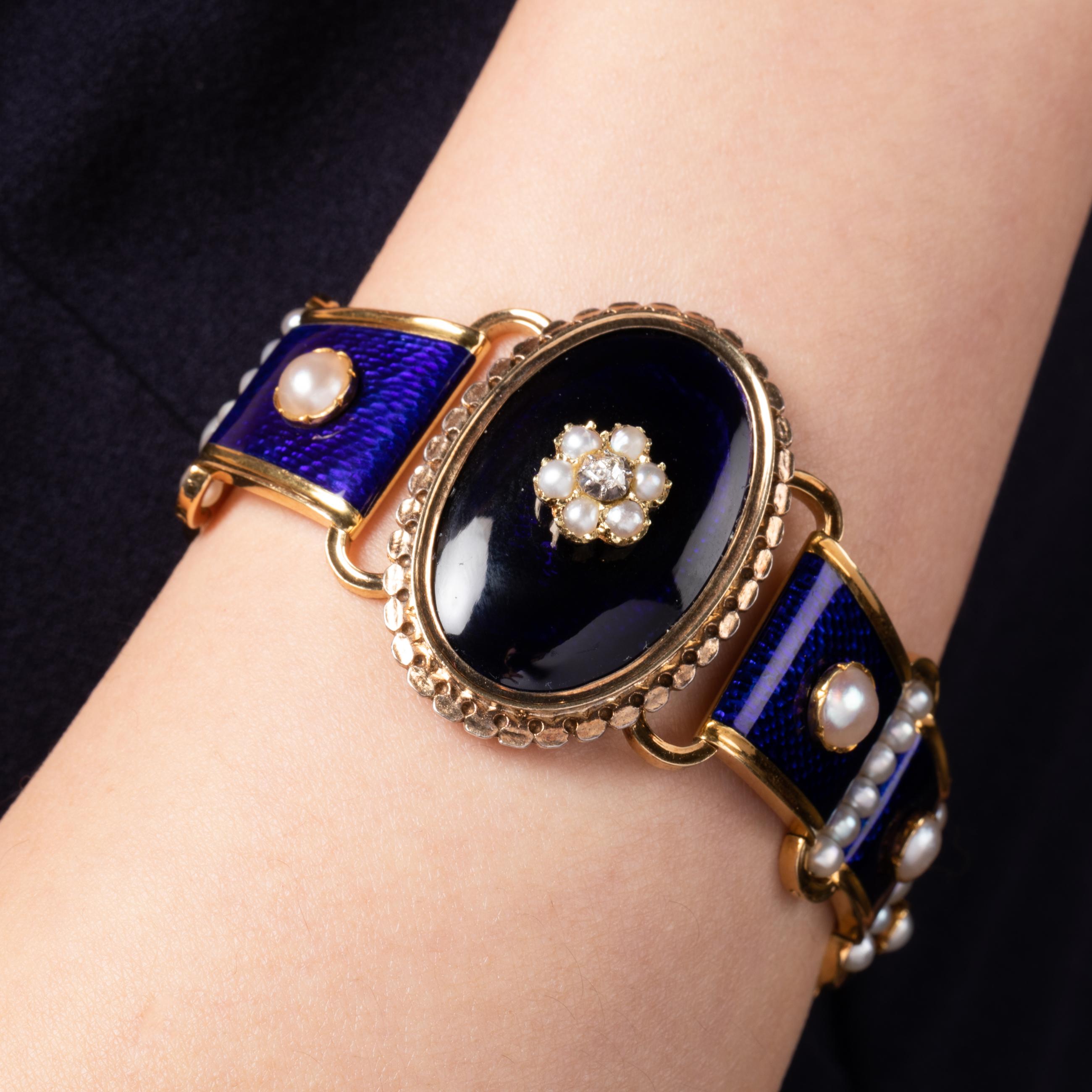 One very lovely antique bracelet, made in France circa 1850.

Made in yellow gold 18k, natural pearls and enamel.

The length is 18cm and the middle part is 36mm. The enamel is in very good condition.