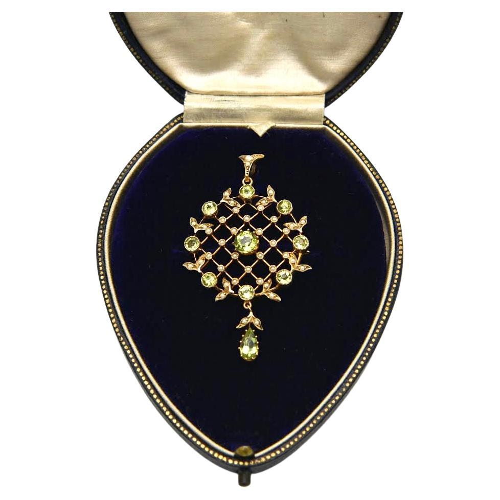 Antique gold pendant/brooch with peridots and pearls, Great Britain, early XXcen