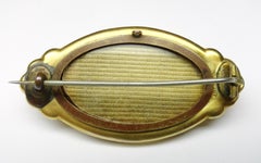 Broche porte-photo en or antique