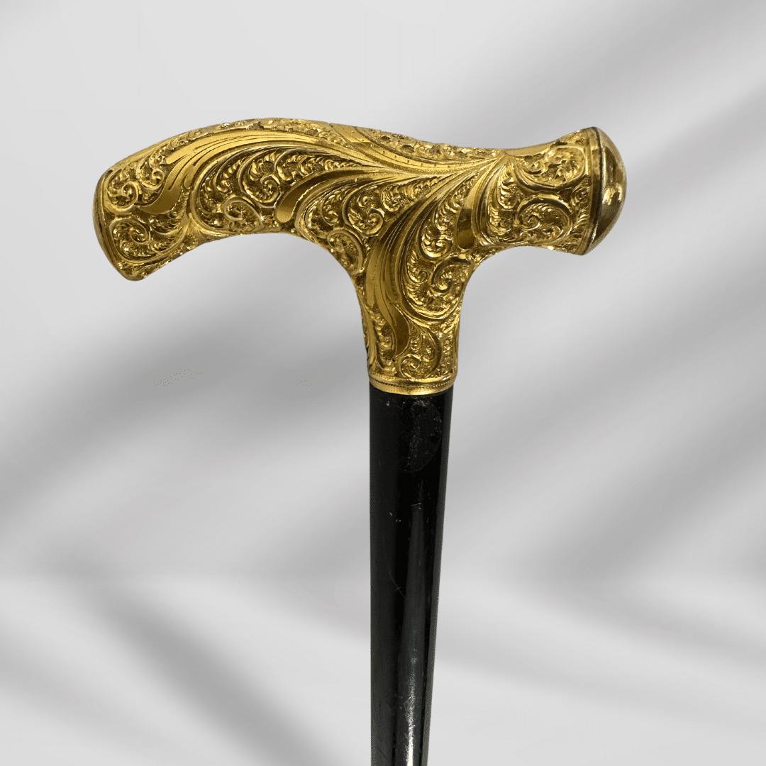 Antique Gold Plate Handle Walking Cane Wooden Walking Stick For Men

This exquisitely detailed antique walking stick is a fine example of turn of the century craftsmanship. Its design is simultaneously Classic and Timeless with a Gold Plated handle