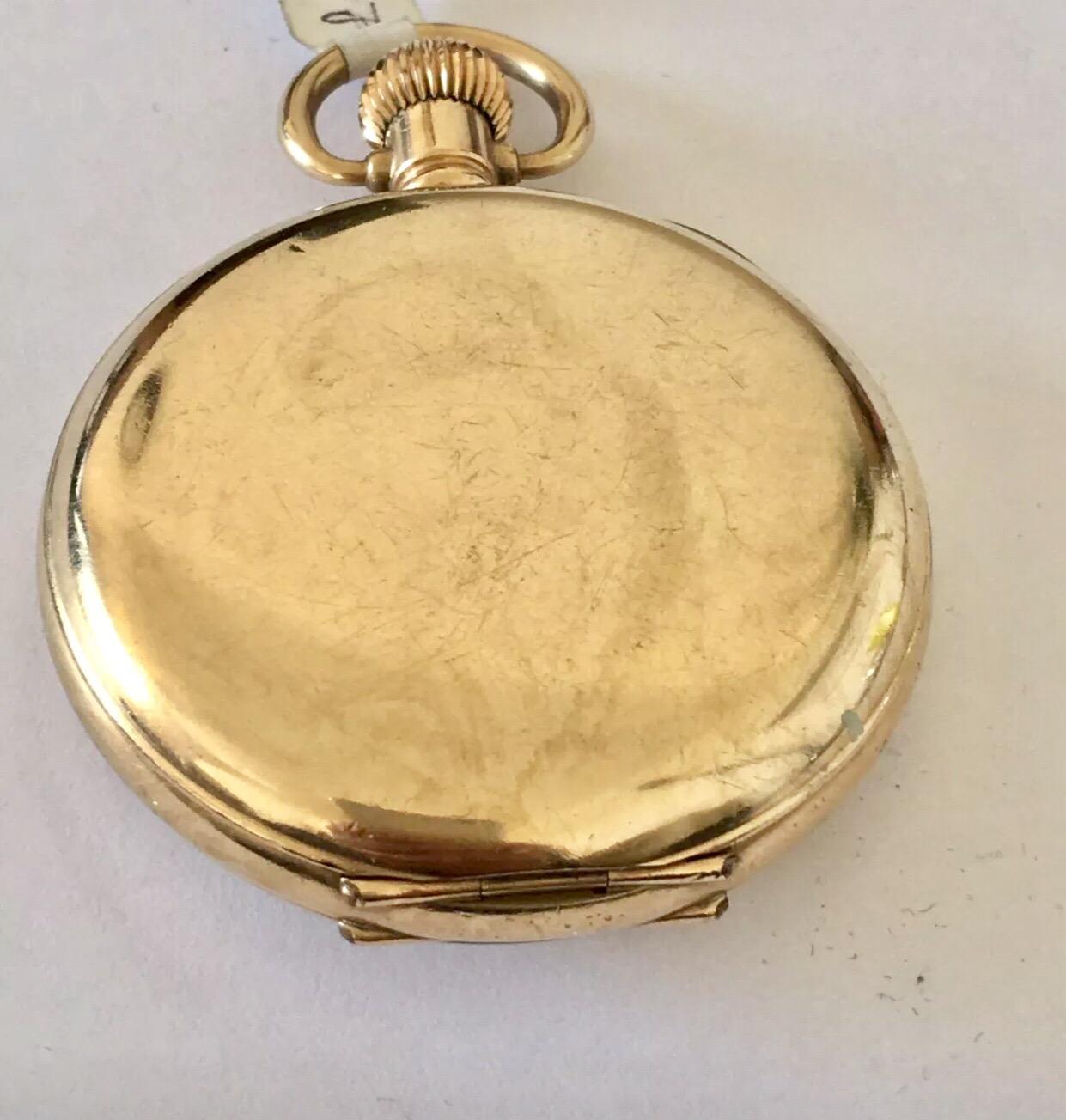 Antique Gold Plated Half Hunter Swiss Made Pocket Watch Signed Cox & Son, Summit Lever, GT Yarmouth.

This watch is in good working condition and and ticking well.