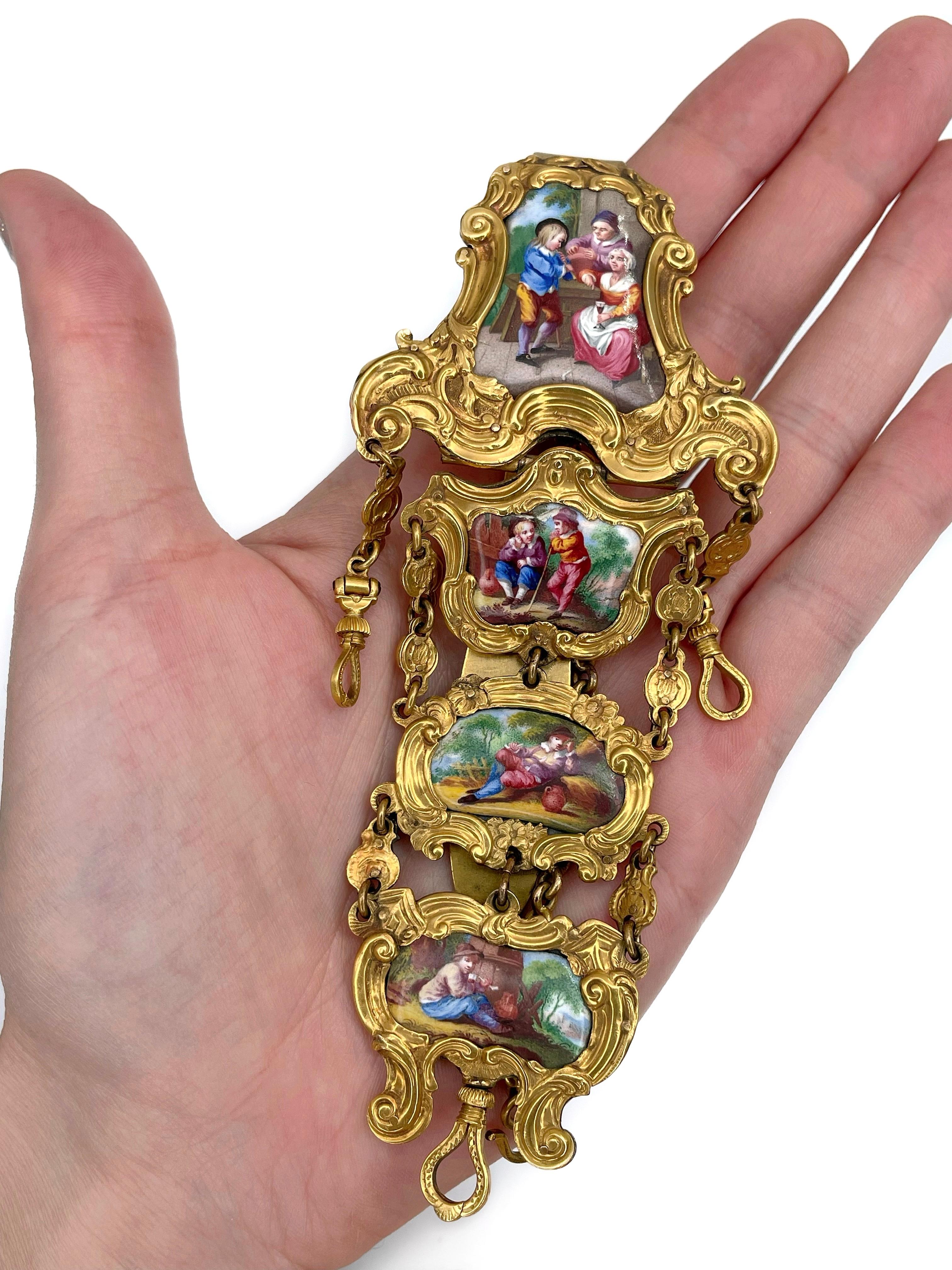 This is an antique chatelaine with a belt hook crafted in base metal and adorned with gold. Circa 1800.

It features several scenes of wine tasting vividly painted on a porcelain. The piece is rich in decorations. It has segments with small