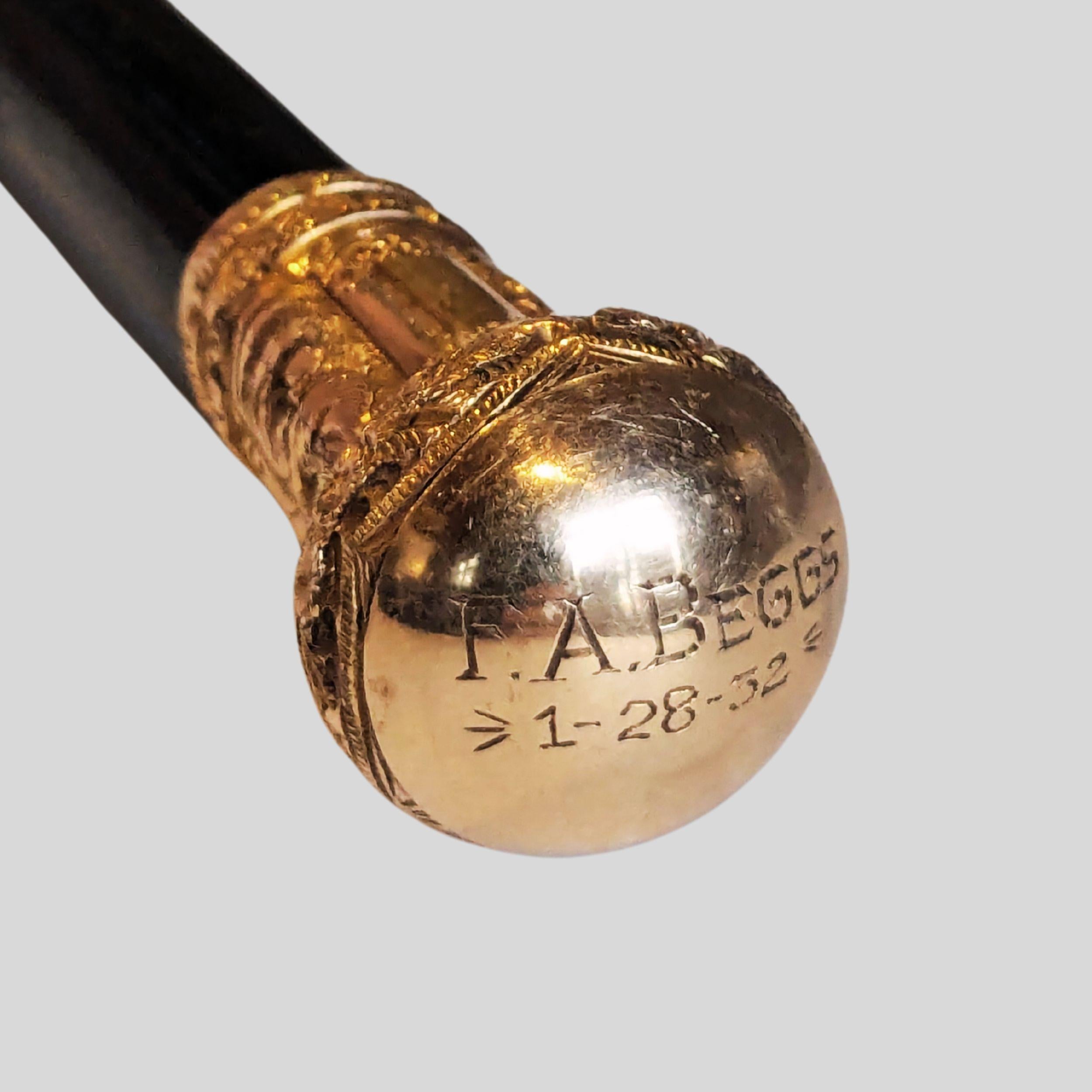 Antique Gold Plated Walking Stick Cane  Year 1832

This piece is an exceptional example of the marriage between function and design.  This antique walking stick / cane features a gold plated knob-style handle with intricate, finely crafted floral