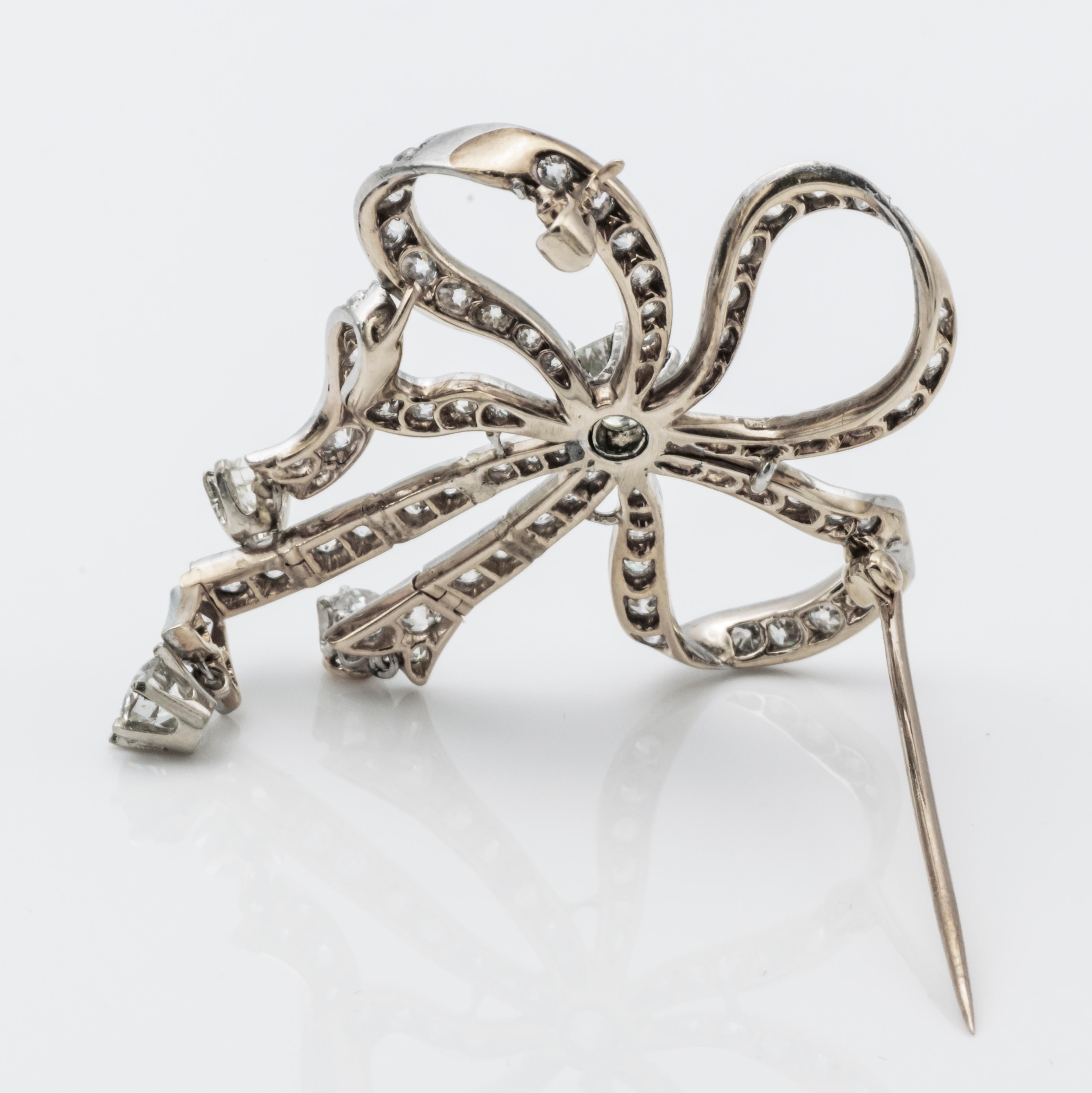 Antique Gold Platinum and Diamond Bow Brooch In Excellent Condition In New York, NY