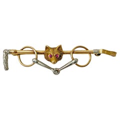 Broche ancienne en or, platine, rubis et renard C.1900