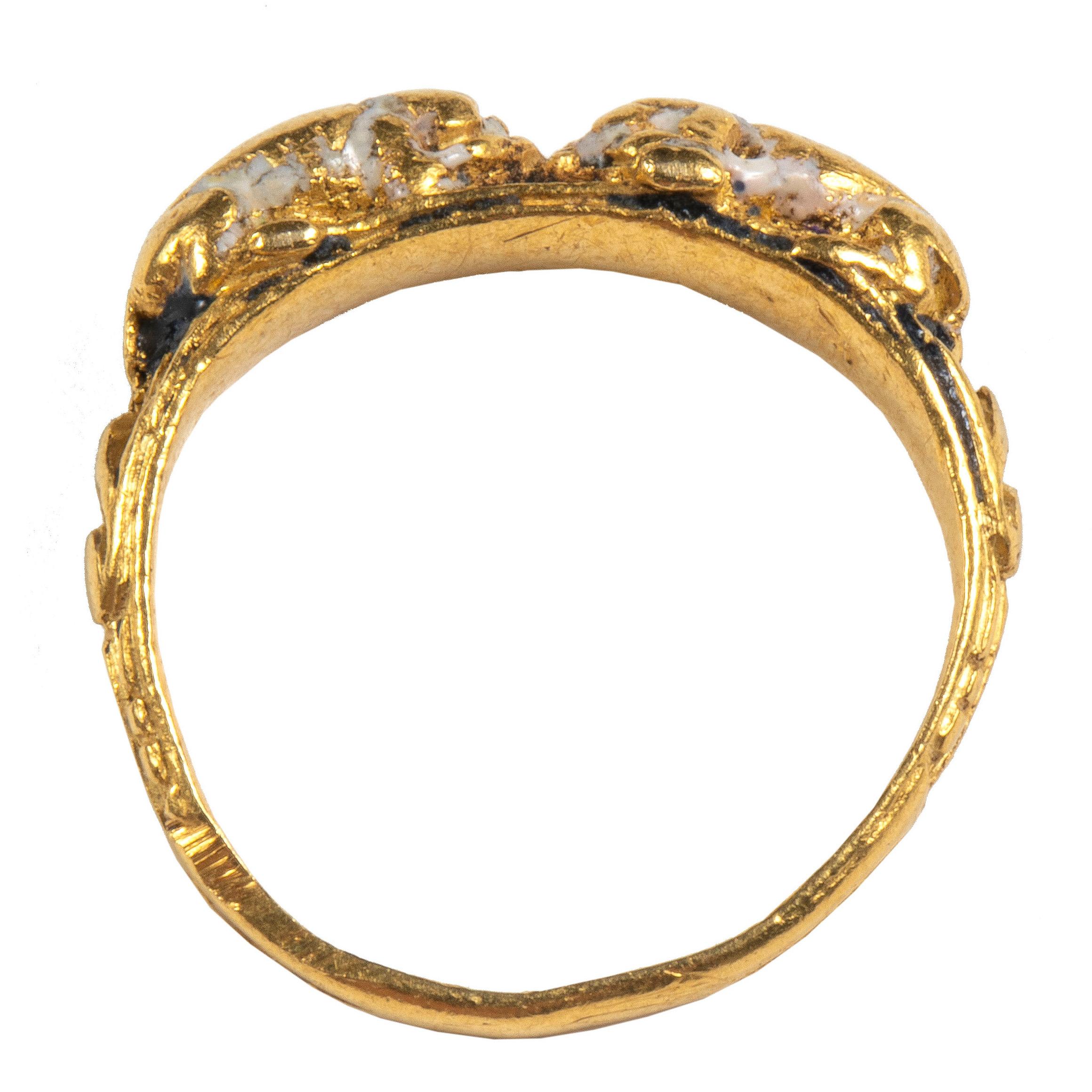 Renaissance Ring
Western Europe, likely Italy, mid-16th c.
Gold and traces of black and white enamel
Bezel 15 x 3 x 4 mm.; circumference 42 mm.; weight 2.7 gr.; US size 2 ¼; UK size D ½

Thin circular hoop, soldered with a second hoop sculpted in