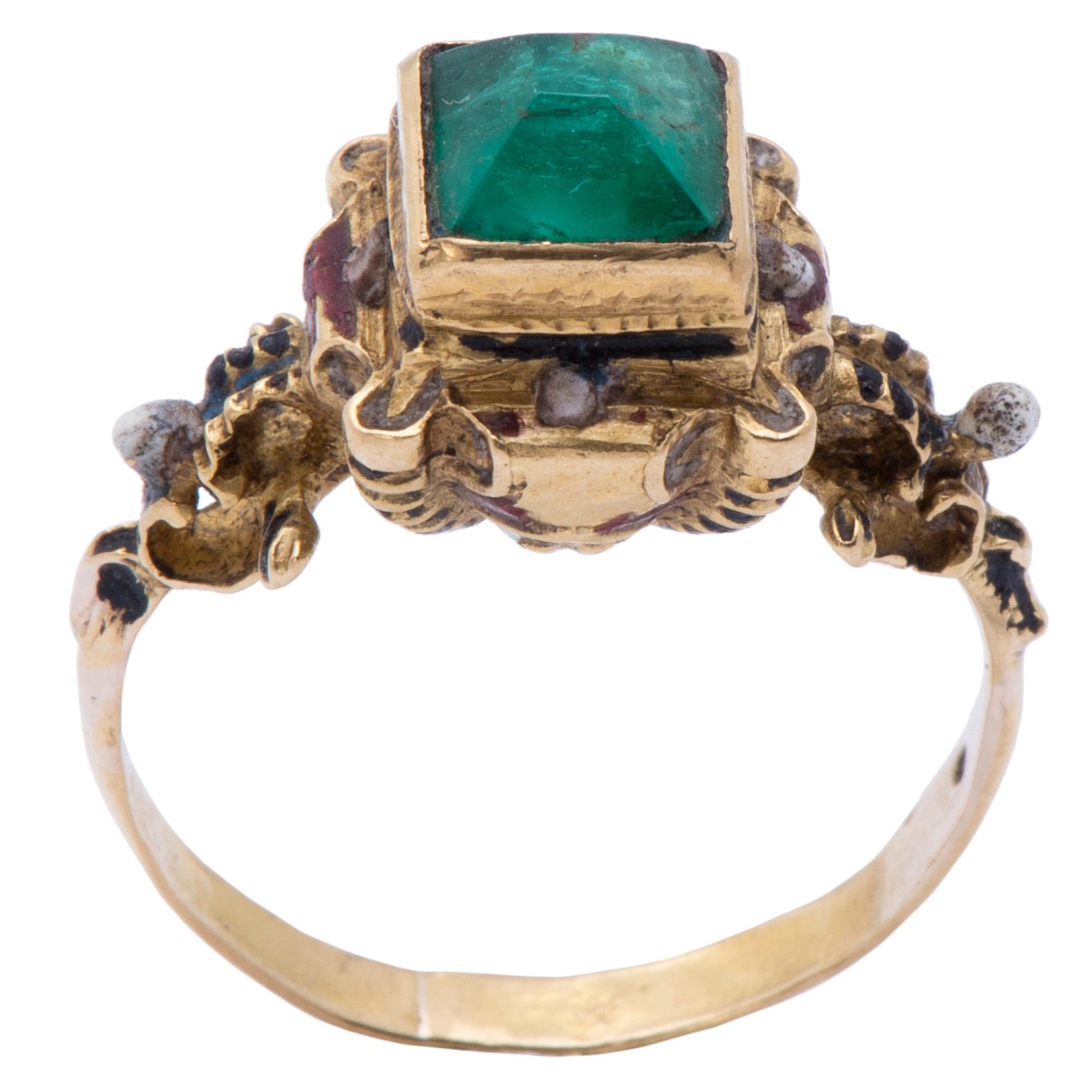 RENAISSANCE REVIVAL RING 
Western Europe, late 19th to early 20th century 
Gold, glass and polychrome enamel 
Weight 4.3 gr.; bezel 10.7 x 11.00 x 11.1 mm.; circumference 55.3 mm.; US size  7.5; UK size P 

A slender hoop supports a massive
