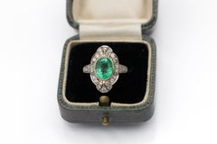 Antique gold ring with emerald and diamonds, 1930s