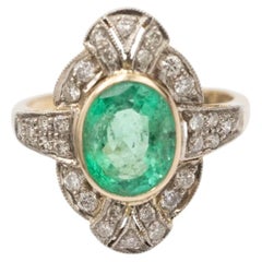 Antique gold ring with emerald and diamonds, 1930s