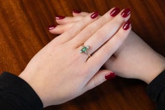 Antique gold ring with emerald and diamonds, Scandinavia, ca. 1910/1920.