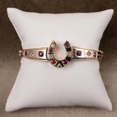 Antique Gold Ruby and Diamond Horseshoe Bangle, circa 1910