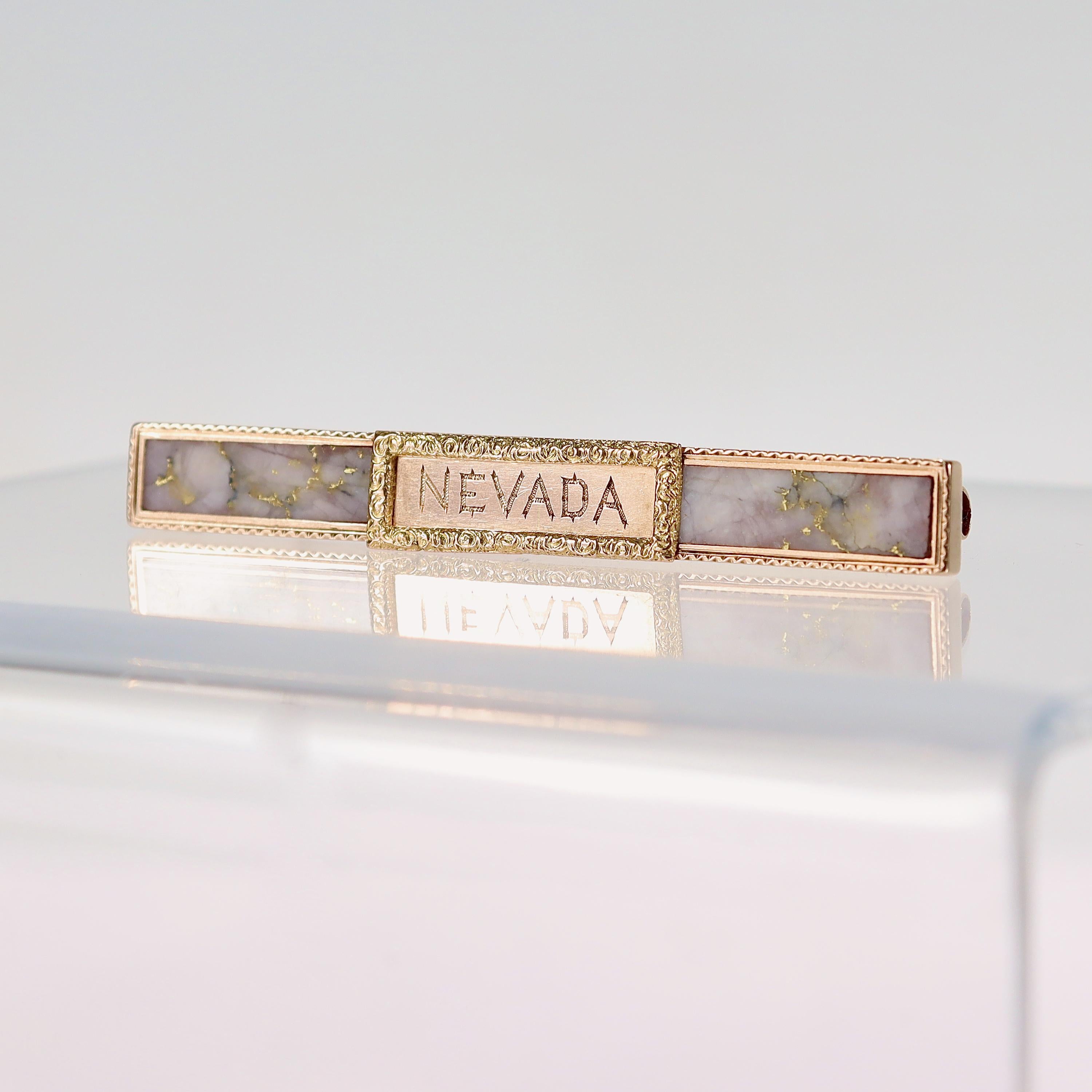 A very fine Gold Rush pin.

Set in 14 karat yellow gold. 

With a bezel set a rectangle bar of gold quartz mounted with an engraved plaque to the center identifying Nevada.

Simply a great piece of wearable American History! 

Date:
Early 20th