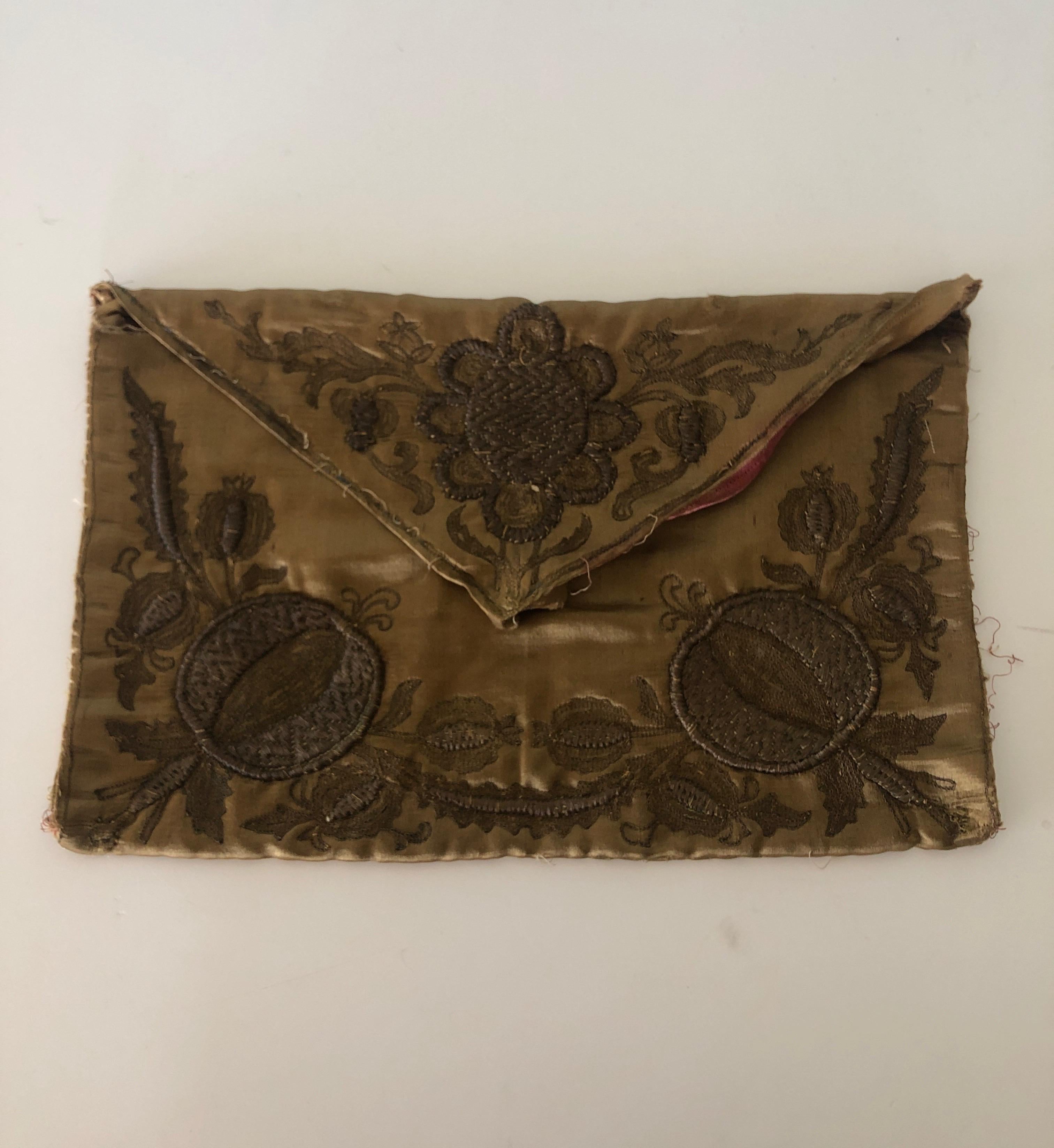 Antique gold silk and metallic threads embroidery textile.
Originally a bag, ideal for a pillow or to frame in a shadow box.
Size closed: 9