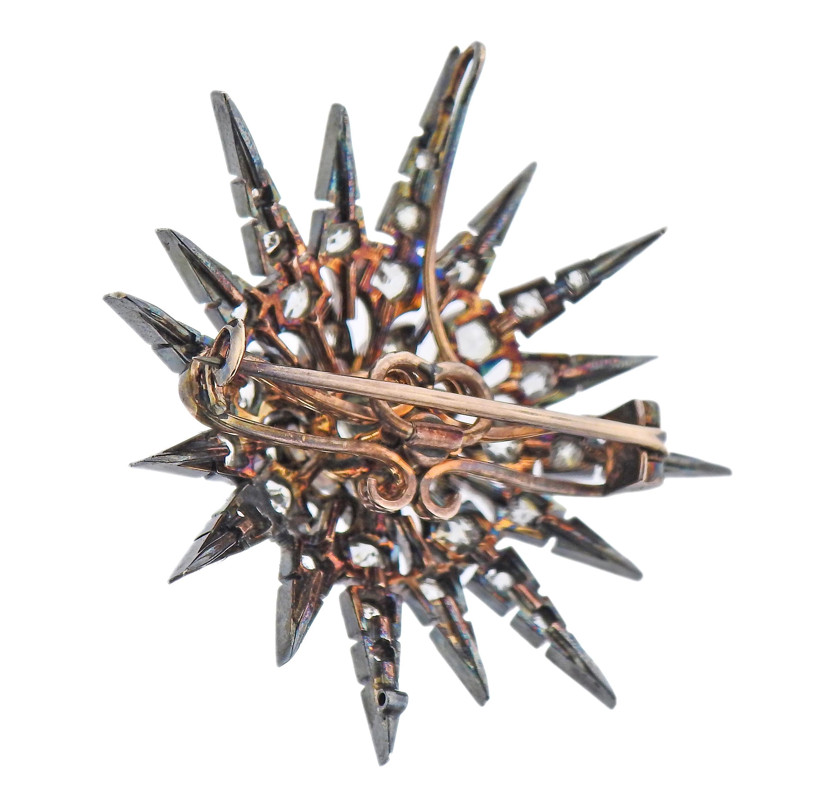Antike 14k Gold und Silber Starburst Brosche/Anhänger, geschmückt mit ca. 1,50ctw in Rose und alten Mine geschnitten Diamanten. Brosche misst 1,5