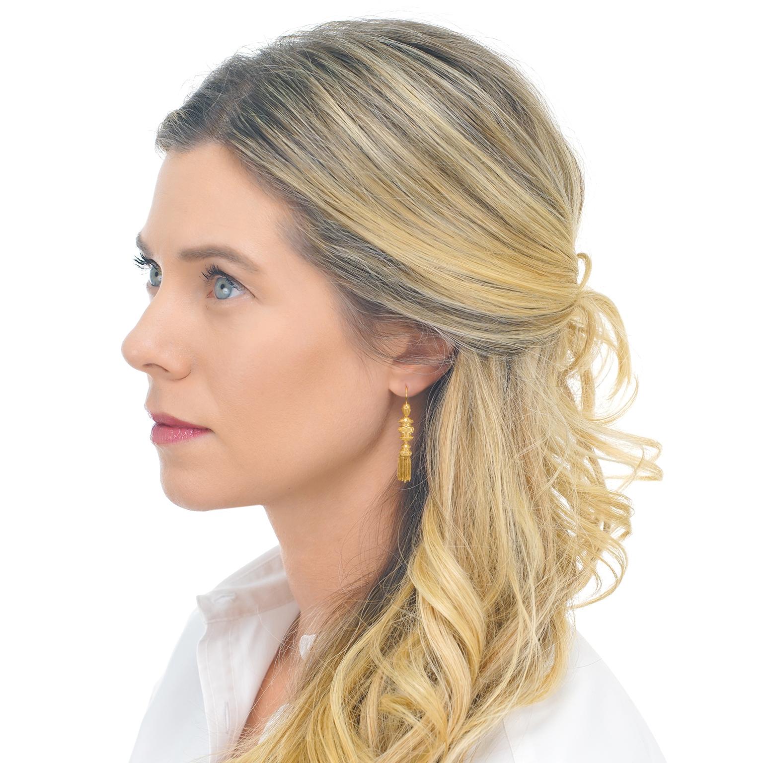 Circa 1880s, 14k, possibly Germany. These fabulous tassel earrings from the Victorian era feature flirty movement and ornate elements. The look is vintage chic at its au courant best! Finely fashioned in 14k gold, they are in excellent condition. 