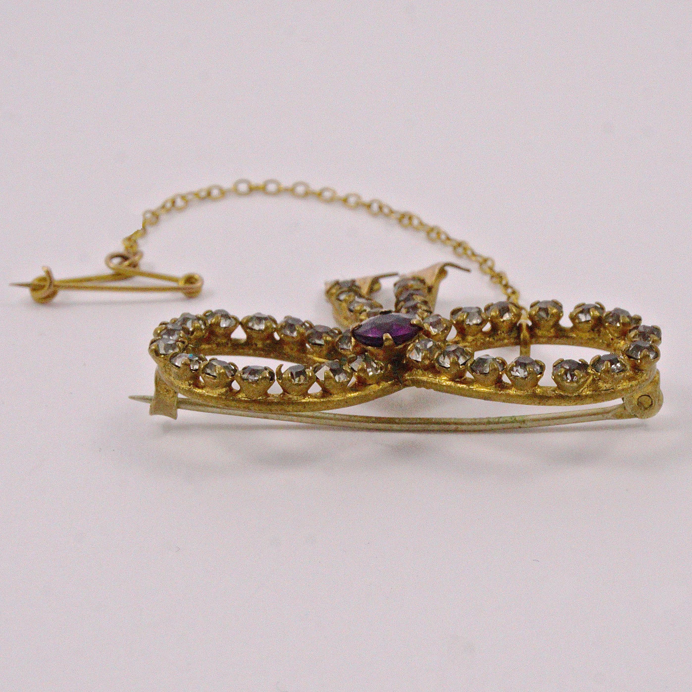 Antique Gold Tone Amethyst and Clear Paste Bow Brooch circa 1910 For Sale 1